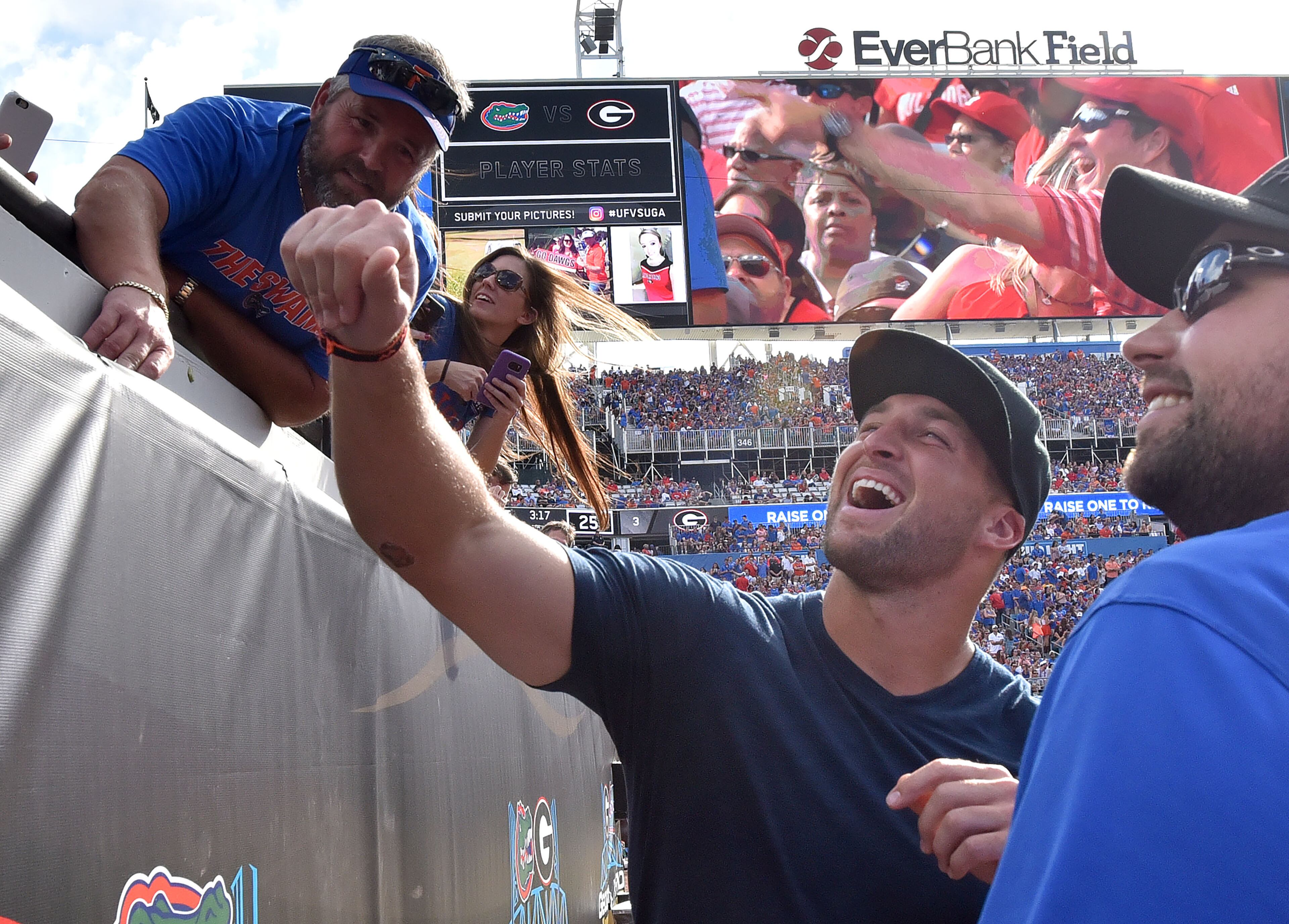 October 29, 2016 Jacksonville, Fla. - TimTebow greets fans in the first half of Georgia and Florida game at EverBank Field in Jacksonville, Florida on Saturday, October 29, 2016. HYOSUB SHIN / HSHIN@AJC.COM