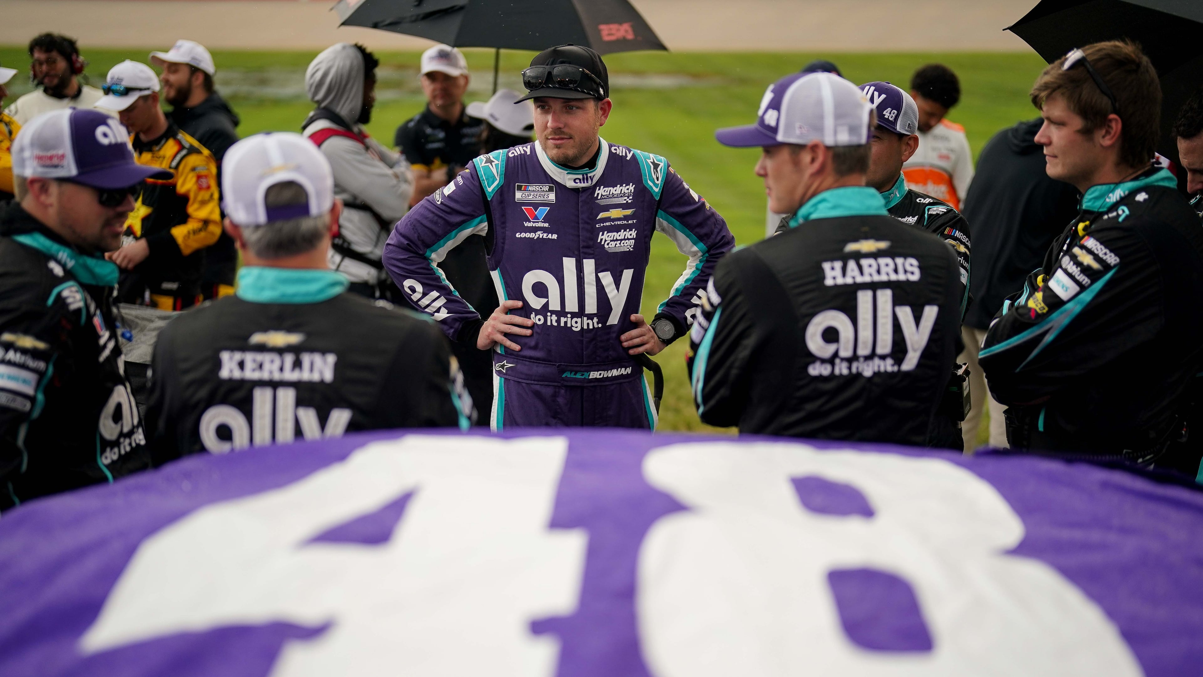 Alex Bowman, center, stands with his team before a NASCAR Cup Series auto race, Sunday, May 31, 2026, in Lebanon, Tenn. (AP Photo/Camden Hall)