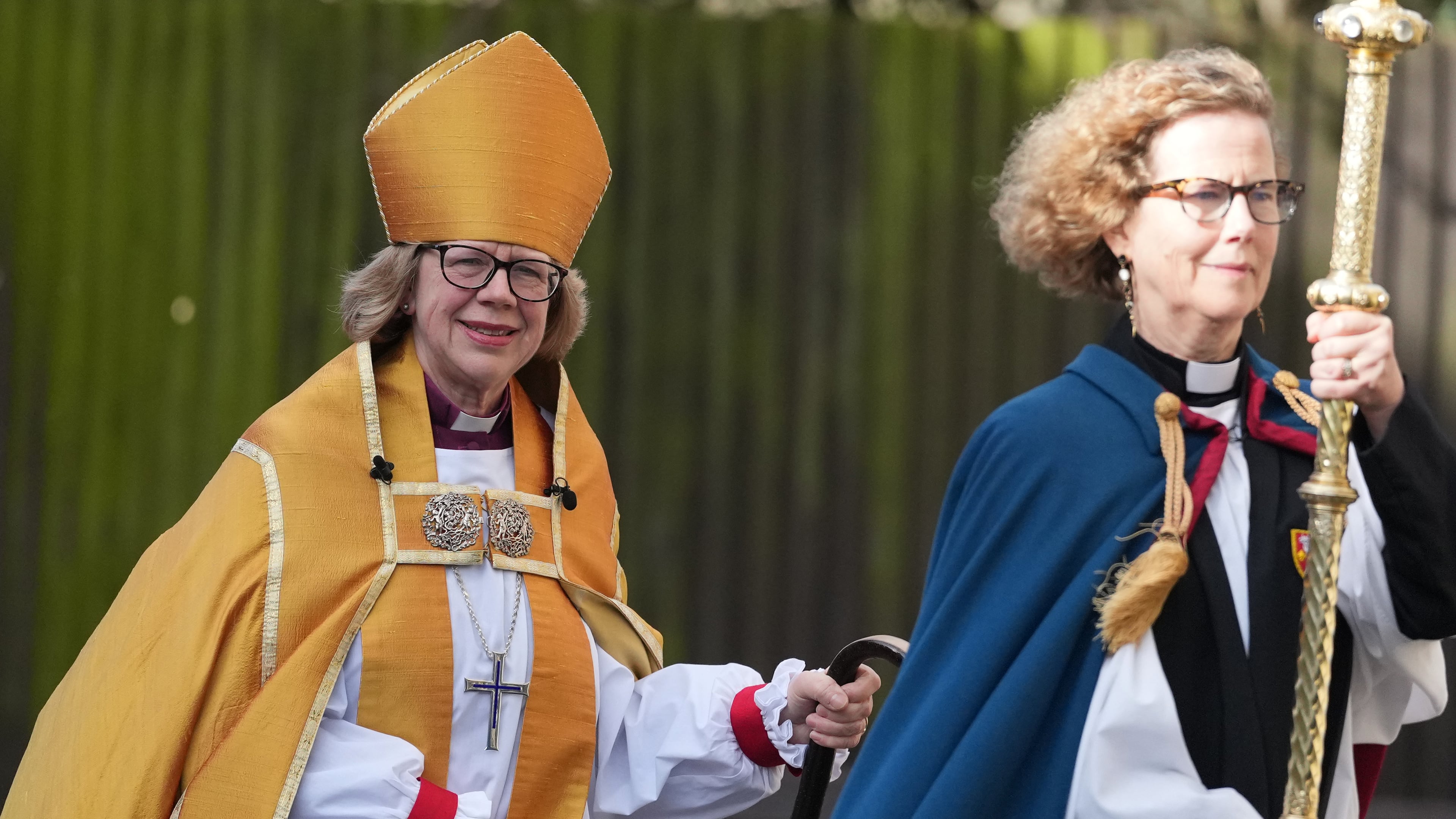 Sarah Mullally, left, arrives for the Enthronement Ceremony installing her as archbishop of Canterbury in Canterbury, England, Wednesday, March 25, 2026, the first woman ever to lead the Church of England. (AP Photo/Alastair Grant)