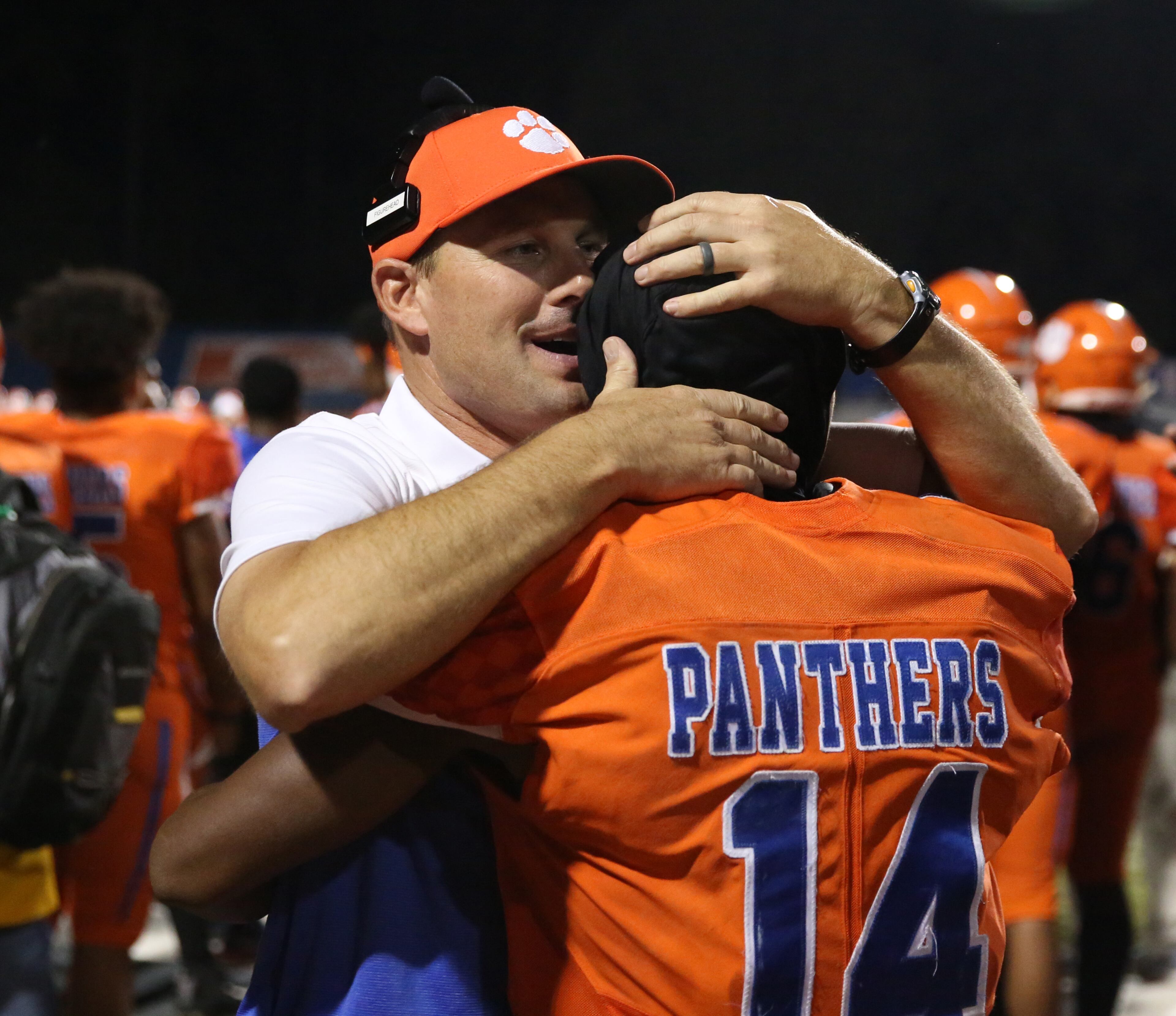 Parkview coach Eric Godfree, facing, celebrates with wide receiver Jared Brown (14) after Brown's 72-yard touchdown catch in the second half against Brookwood at Parkview High School Friday, October 25, 2019 in Lilburn, Ga. Parkview won 50-19. Brown had three long touchdowns with a total of 214 yards receiving. (JASON GETZ/SPECIAL TO THE AJC)