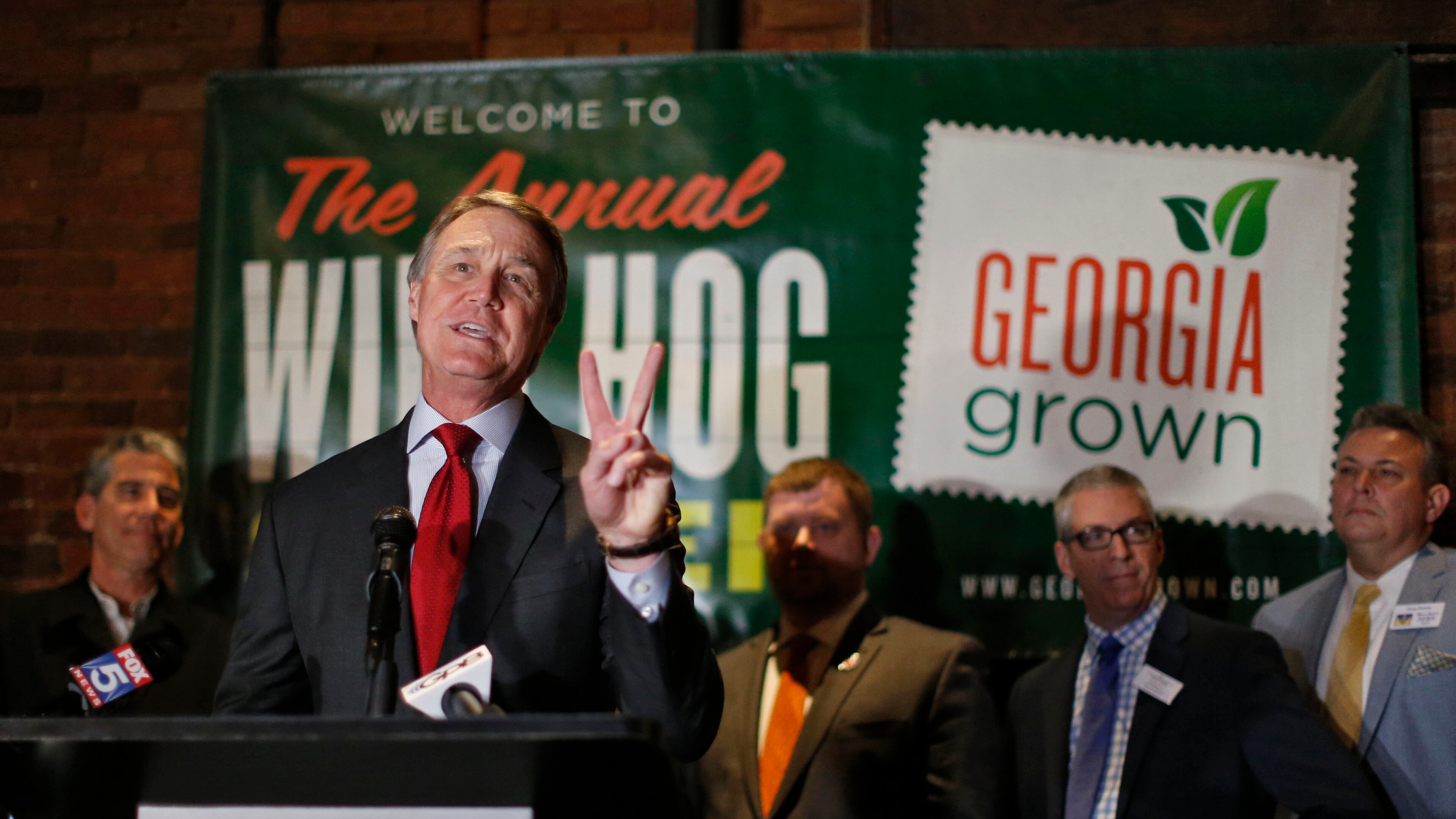 Jan. 10, 2016 - Atlanta - U.S. Sen. David Perdue addresses the supper crowd. The 54th Annual Wild Hog Supper, benefitting the Georgia Food Bank Association, was held at the Georgia Railroad Depot Sunday evening. The "Wild Hog Supper," a Georgia tradition dating back to 1962, marks the opening of the legislative session each year. BOB ANDRES / BANDRES@AJC.COM
