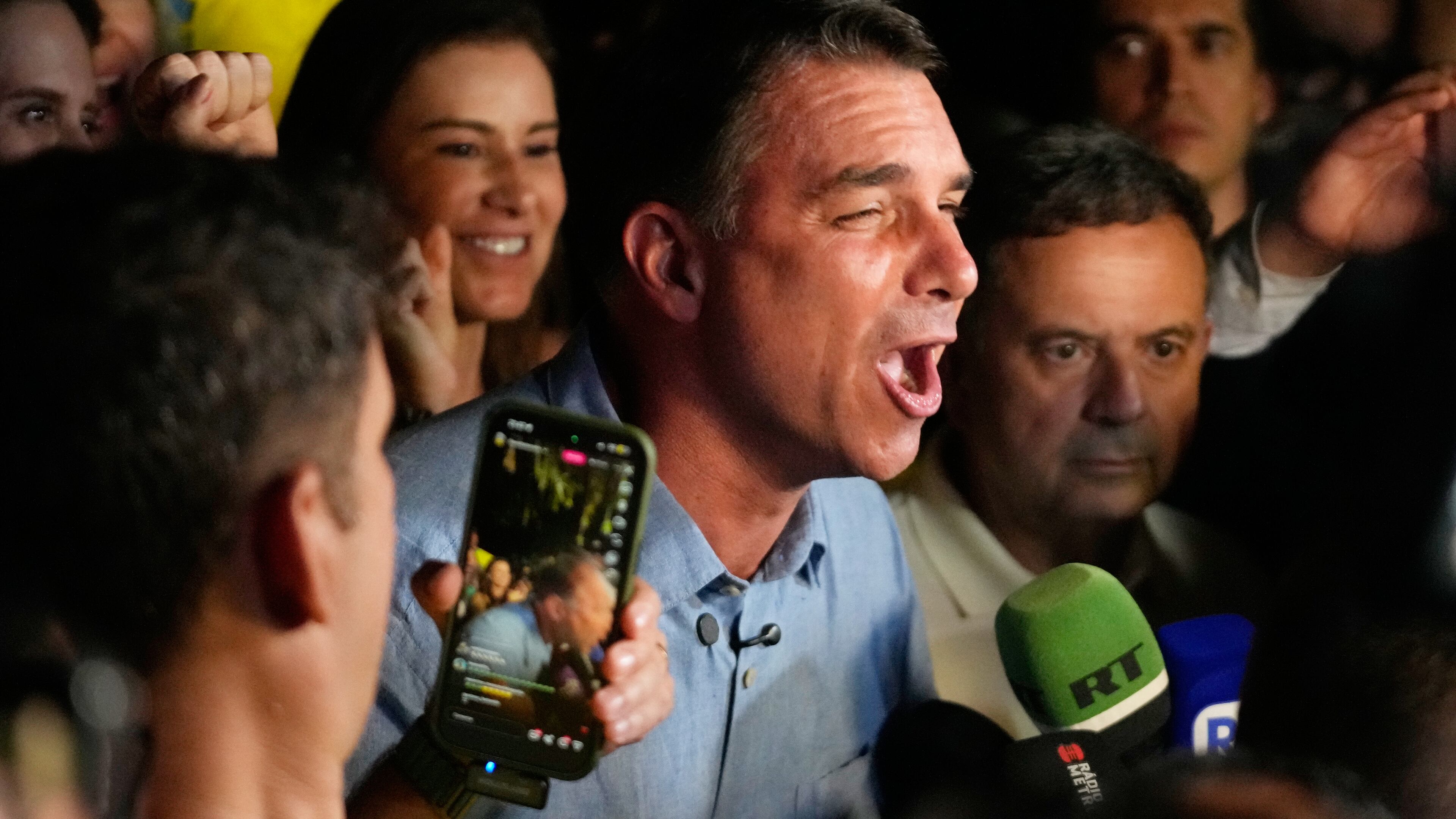 Opposition presidential candidate Sen. Flavio Bolsonaro speaks after advancing to a runoff election following the first round of the presidential election in Brasilia, Brazil, Sunday, Oct. 4, 2026. (AP Photo/Eraldo Peres)
