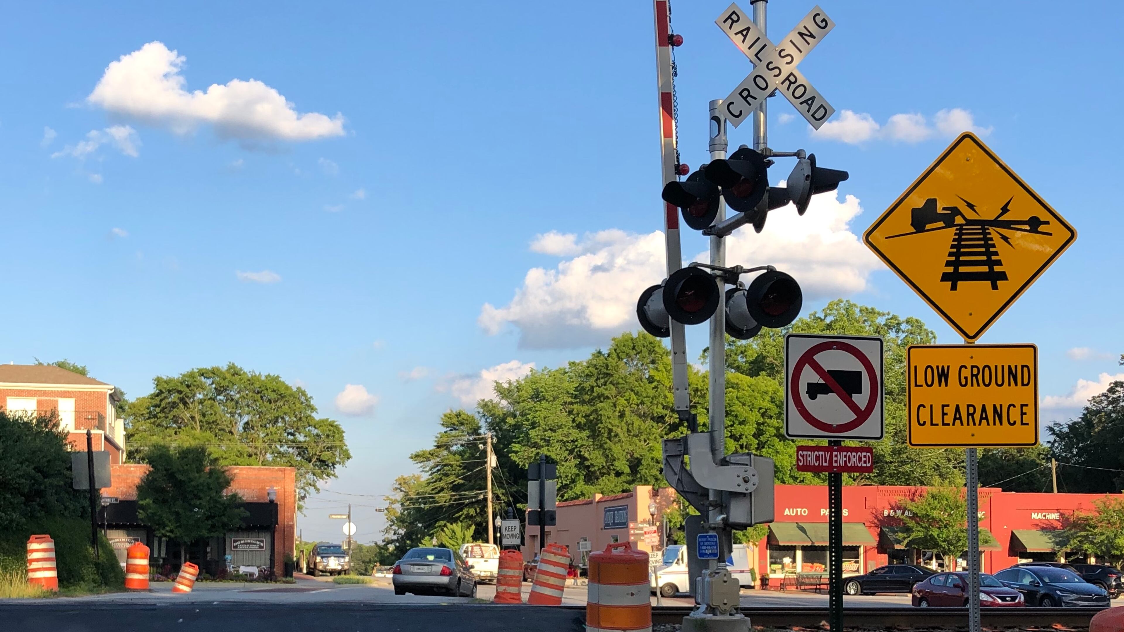 Improvements to the Holcomb Bridge Road at Thrasher Street intersection in Norcross are near completion and traffic over the railroad tracks has reopened. (Photo by Karen Huppertz)