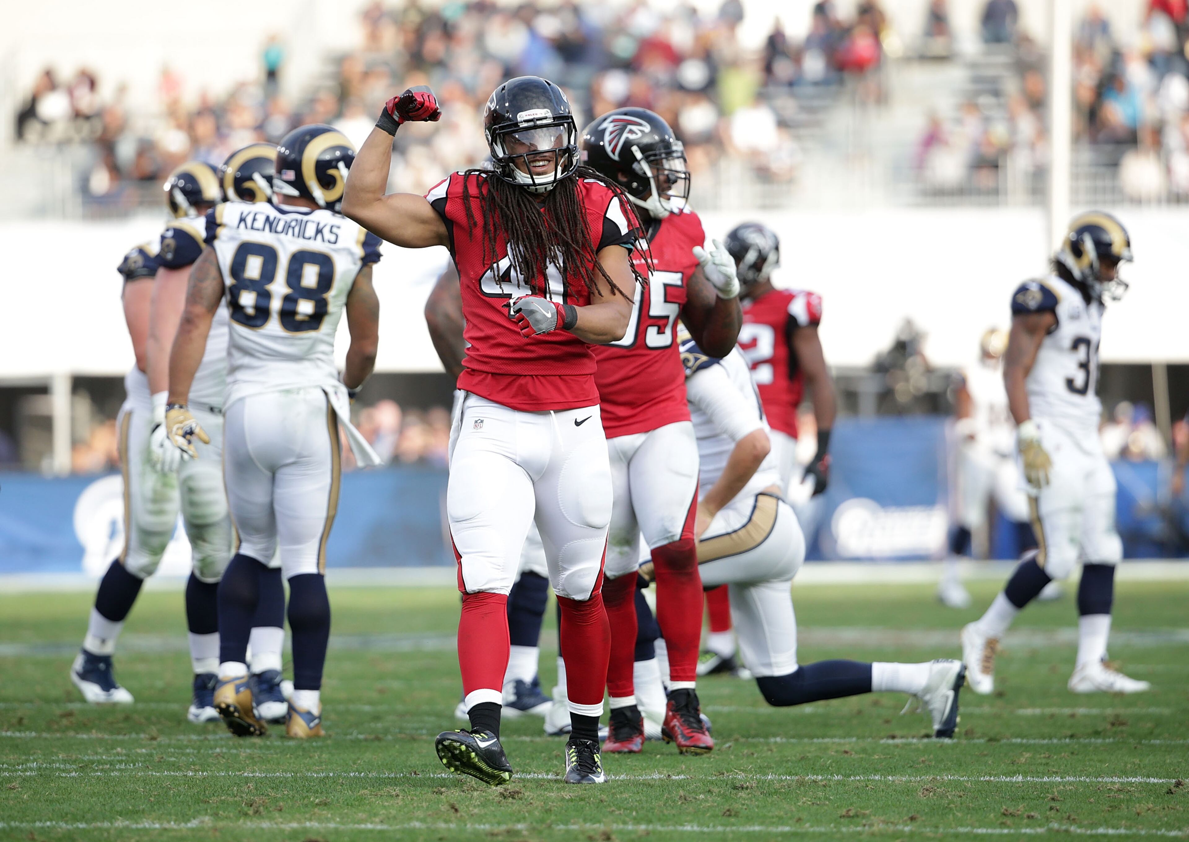 LOS ANGELES, CA - DECEMBER 11: Philip Wheeler #41 of the Atlanta Falcons celebrates a sack against the Los Angeles Rams in the third quarter at Los Angeles Memorial Coliseum on December 11, 2016 in Los Angeles, California. The Falcons defeated the Rams 42-14. (Photo by Jeff Gross/Getty Images)