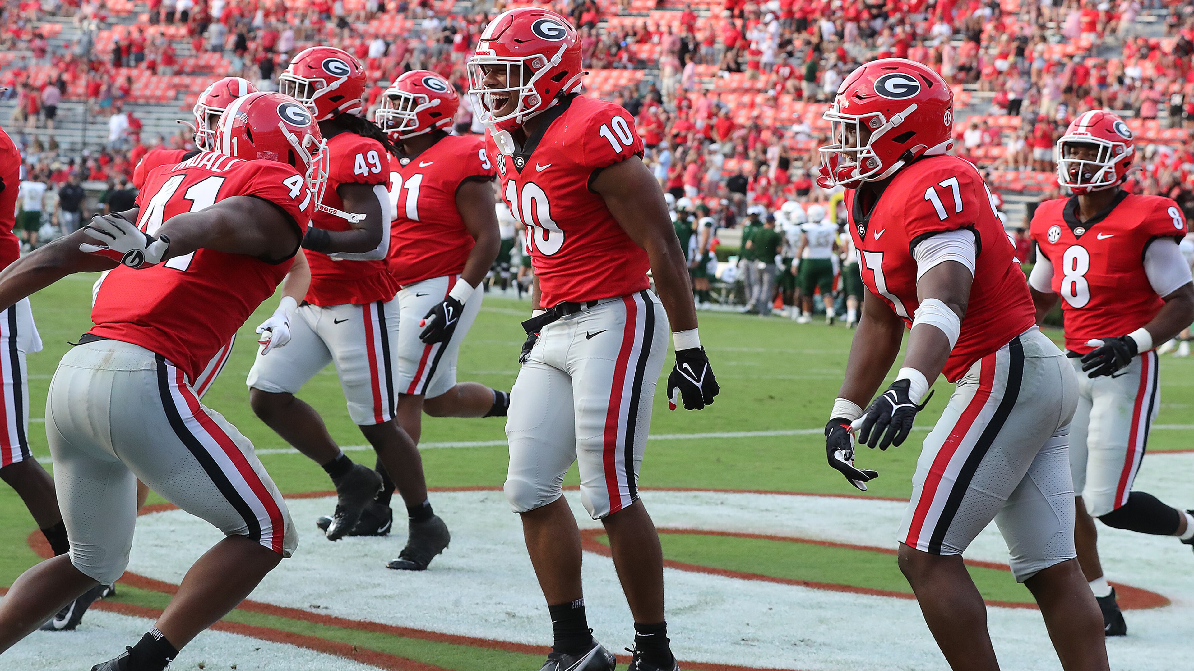Georgia linebacker Jamon Dumas-Johnson (center) celebrates his interception return for a 56-0 lead over UAB with teammates in the end zone during the fourth quarter in a NCAA college football game on Saturday, Sept 11, 2021, in Atlanta. “Curtis Compton / Curtis.Compton@ajc.com”
