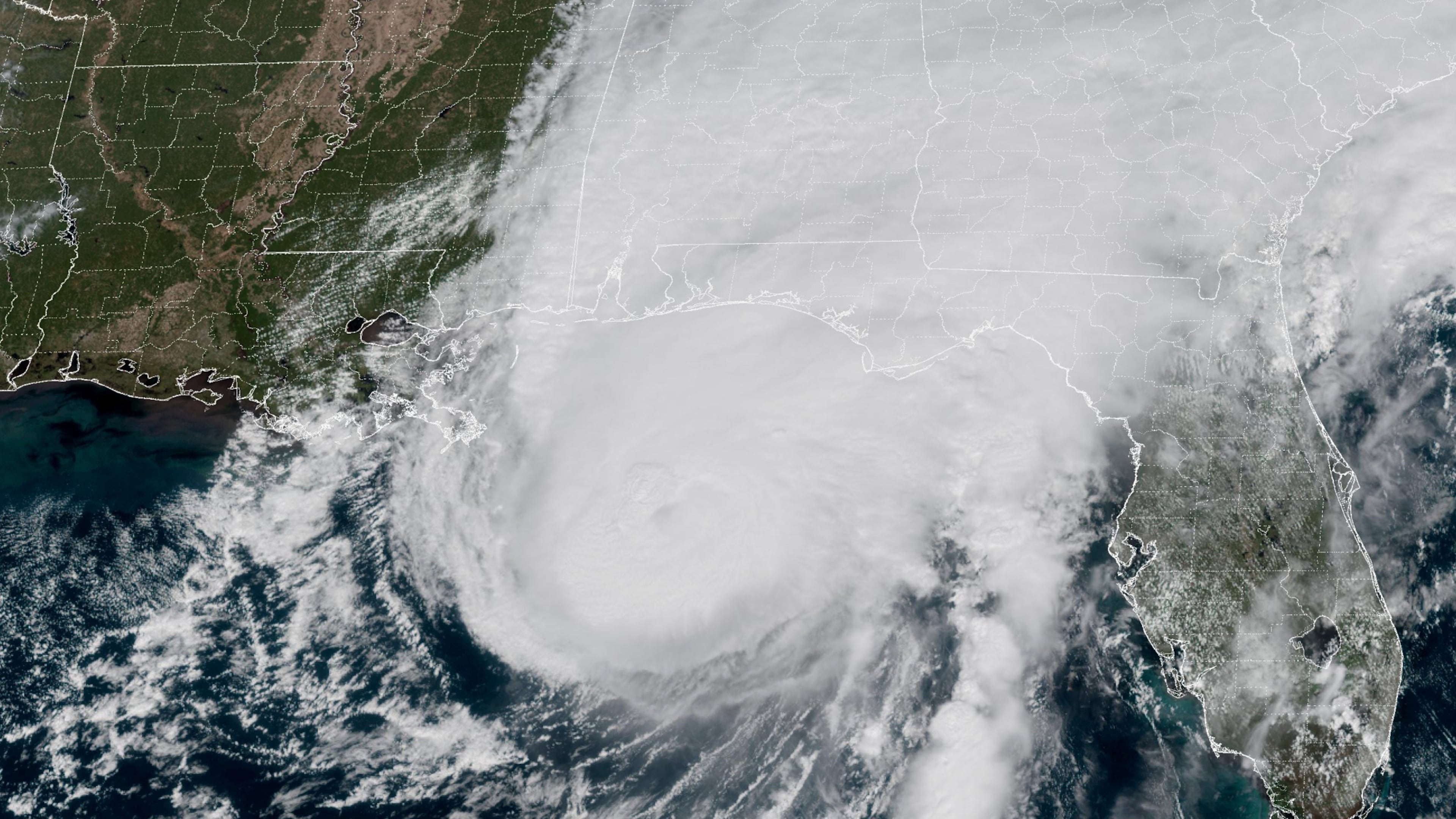 This GOES-19 GeoColor satellite image provided by the National Oceanic and Atmospheric Administration (NOAA) and taken at 1:06 p.m. EDT, Friday, Oct. 9 2026, shows Hurricane Isaias approaching the Gulf Coast of Alabama and Florida . (NOAA via AP)