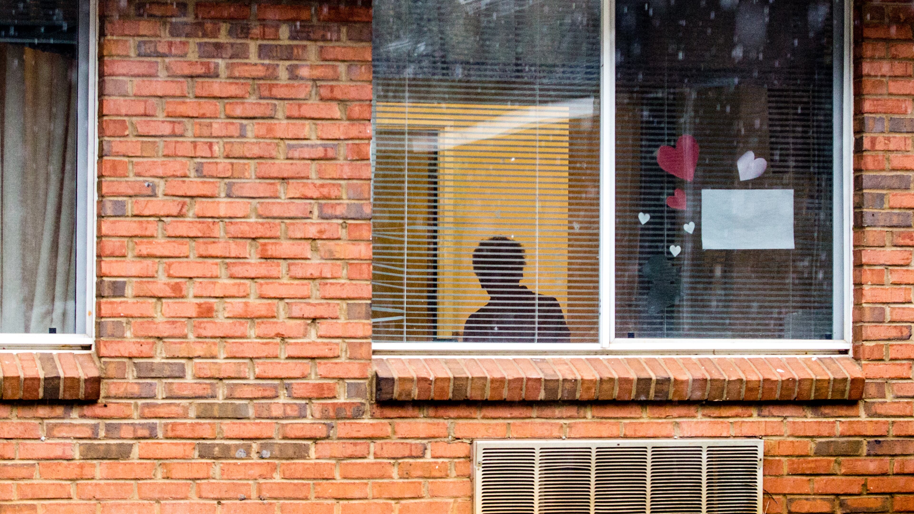 Hundreds of lawsuits against nursing homes blaming patient deaths on negligent care have been tossed out or languished in the courts amid contentious legal battles. Shown here, a resident inside a metro Atlanta nursing facility in February 2021. (Jenni Girtman for The Atlanta Journal-Constitution)
