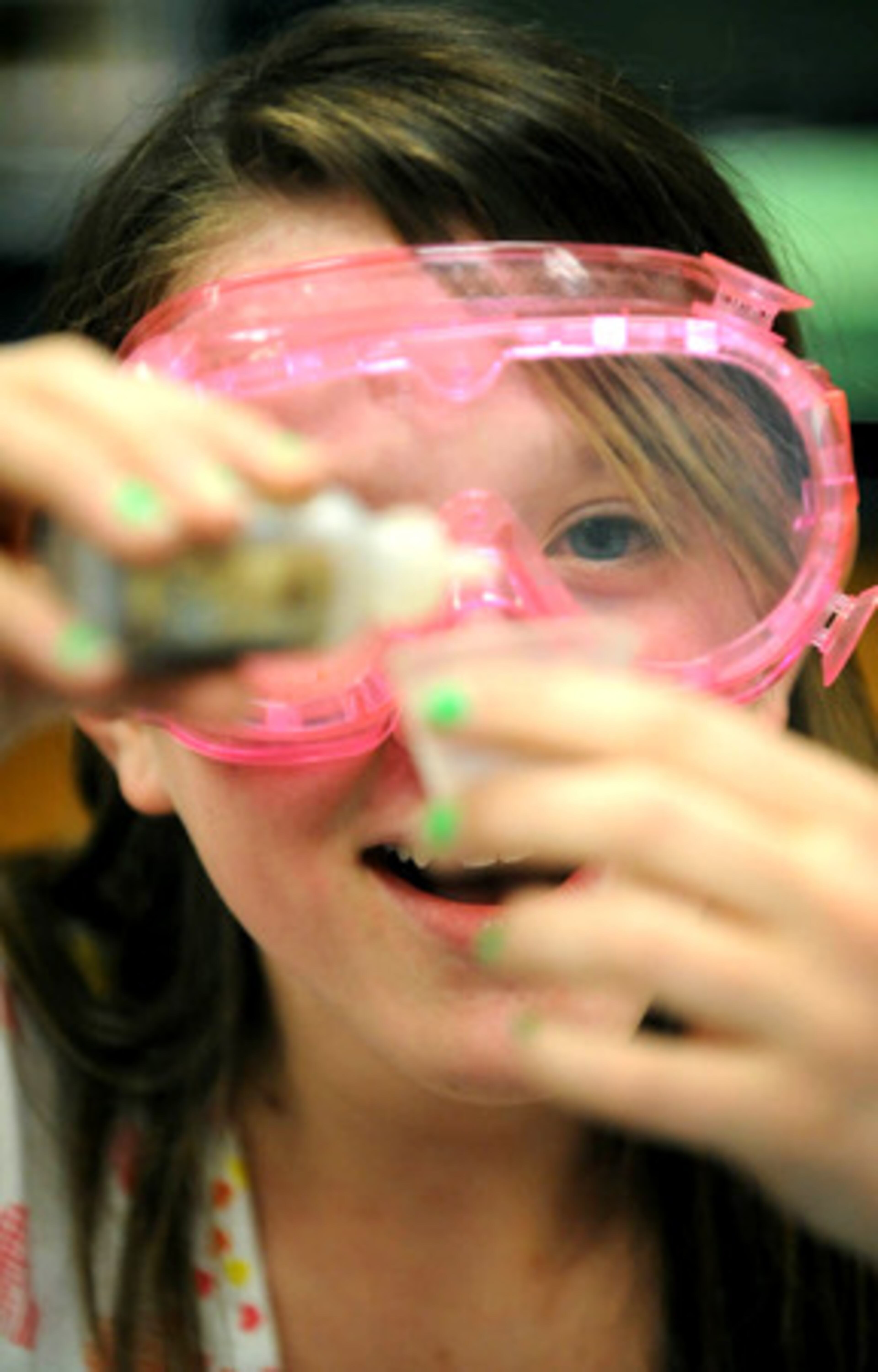 Ninth-grader Hannah Chambless works on Science Crime Busters at J.C. Booth Middle School. Science Crime Busters is an event where students use powders, plastics, metals, fingerprints, DNA prints as well as any other evidence to solve a crime.