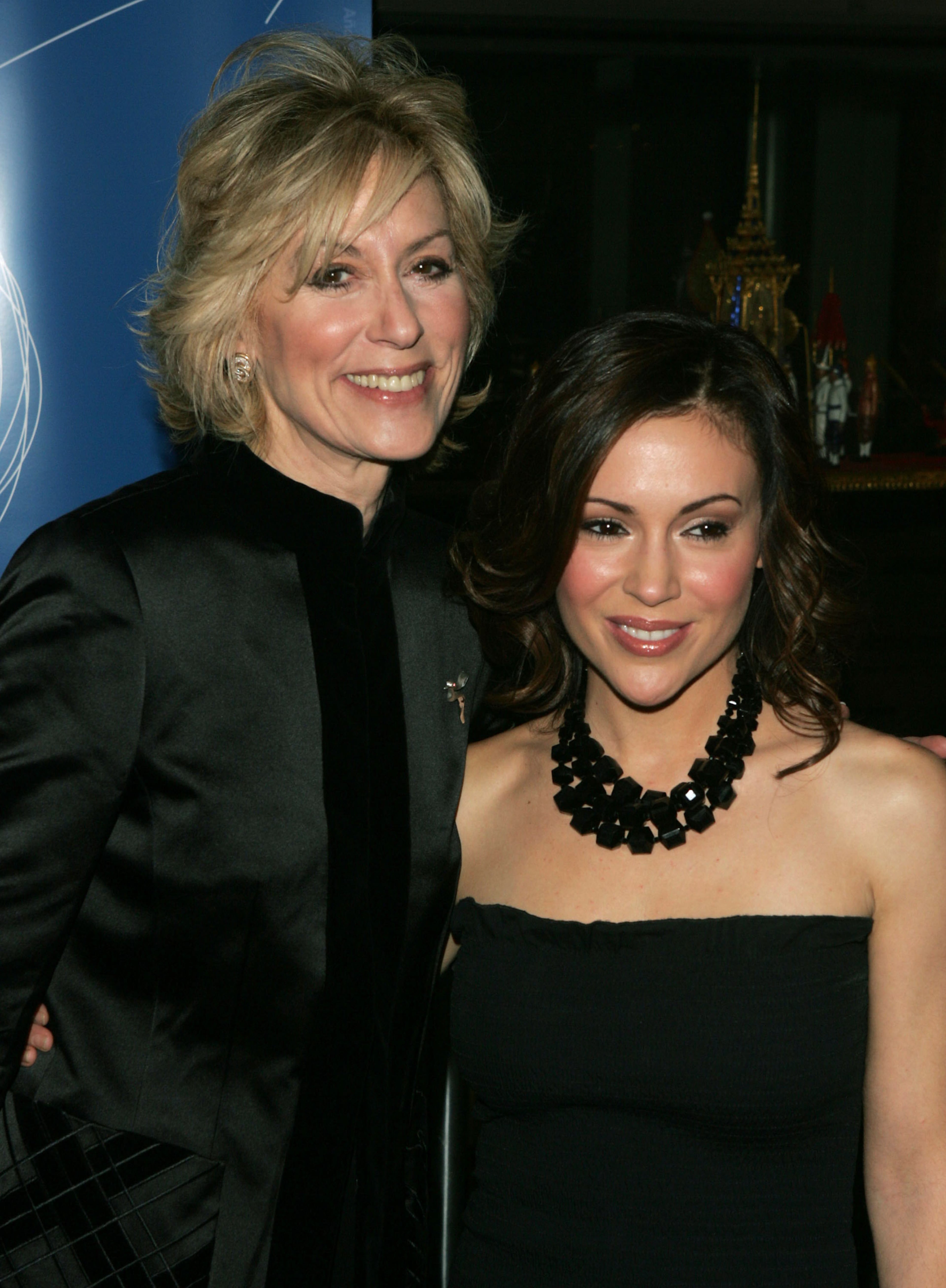 Actresses Judith Light (L) and Alyssa Milano (R) attend the United Nations gala honoring the Unsung Heroes of Poverty November 8, 2005 in New York City. (Photo by Peter Kramer/Getty Images)