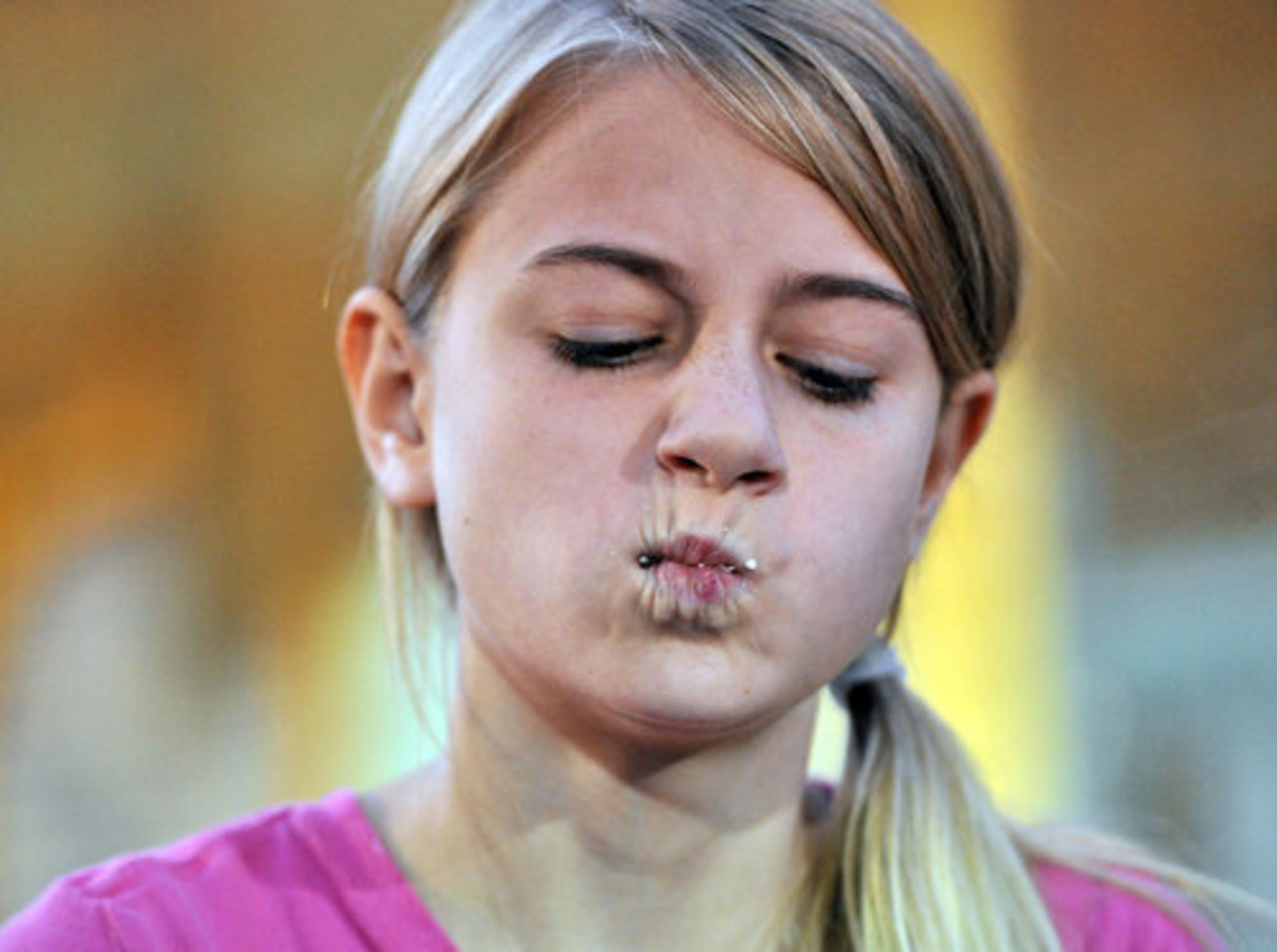 Now the realization has hit Davis. She's eating a Madagascar hissing cockroach.