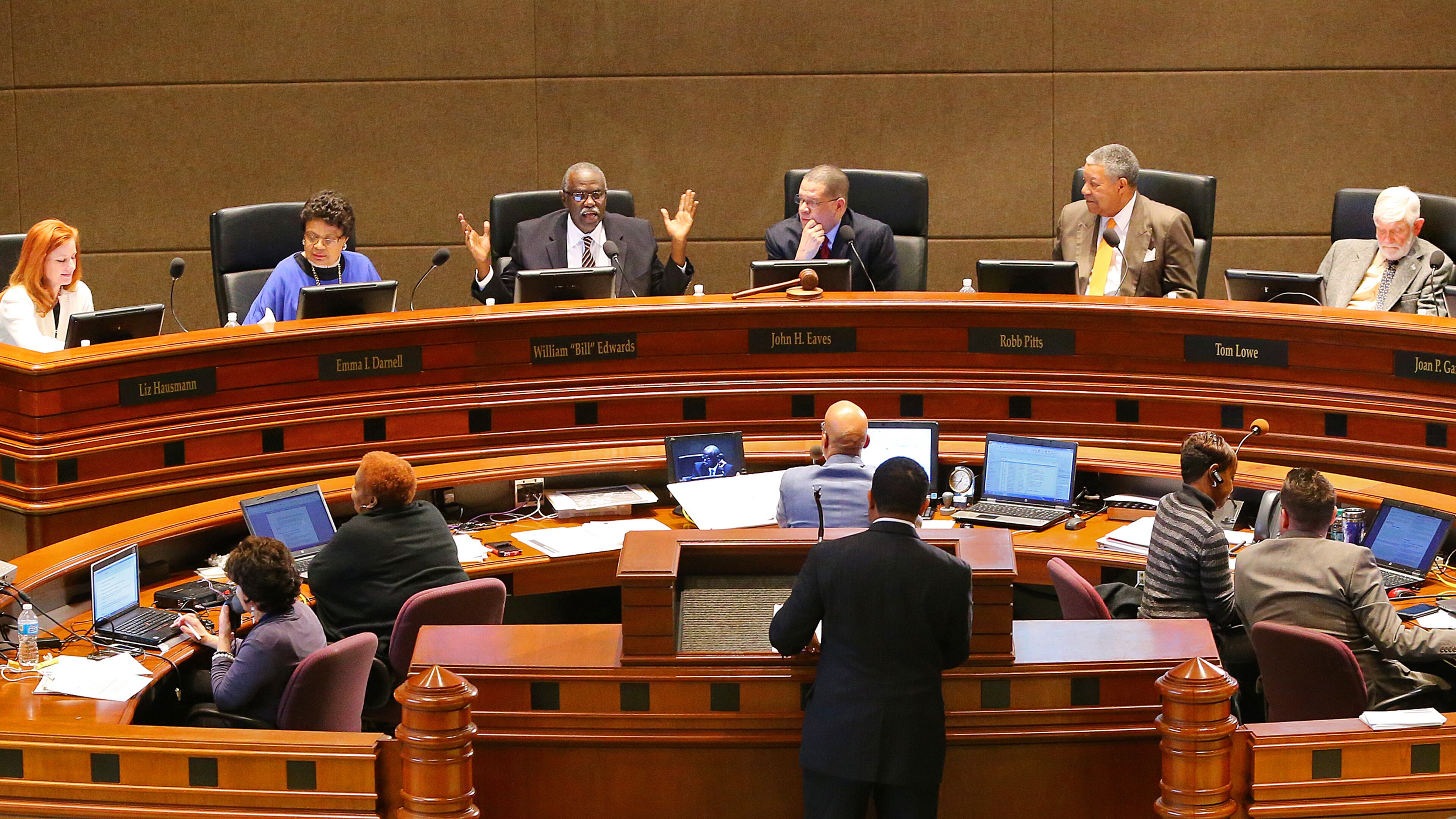 030514 ATLANTA: Fulton County Commission members Liz Havsmann (from Left), Emma Darnell, William Edwards, Chair John Eaves, Robb Pitts, Tom Lowe, and Joan Garner listen to debate in the Assembly Hall during the commission meeting on Wednesday, March 5, 2014, in Atlanta. CURTIS COMPTON / CCOMPTON@AJC.COM The Fulton County Board of Commissioners will take public comment on the 2015 budget Wednesday