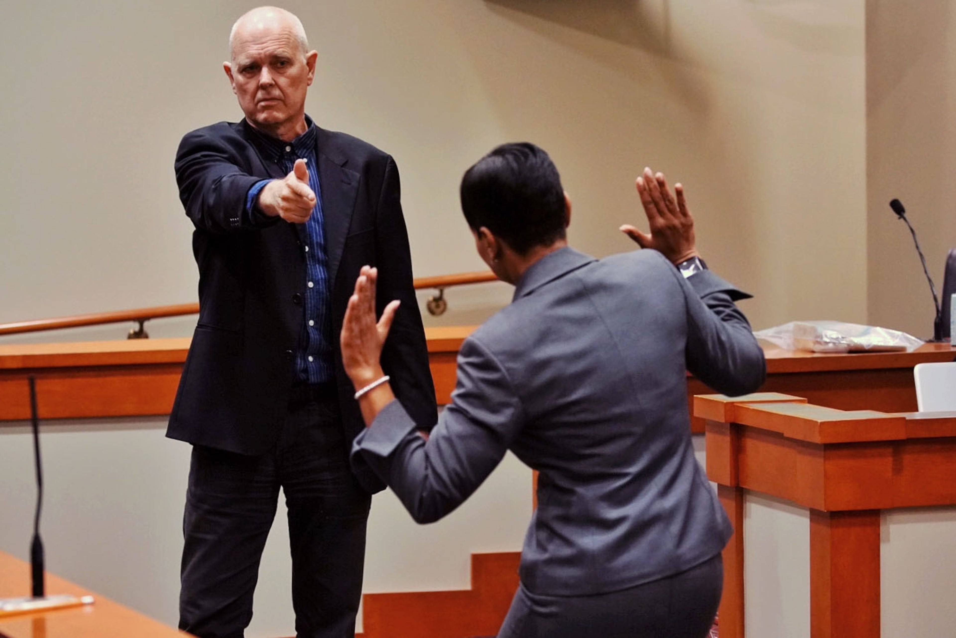 Lead prosecutor Buffy Thomas uses Dr. Geoffrey Smith, deputy chief medical examiner at the Dekalb County Medical Examiner's office as a stand in for Robert Olson while questioning him under oath during day three of the Robert Olson murder trial at the DeKalb County Courthouse on October 1, 2019 in Decatur. Olsen is charged with murdering war veteran Anthony Hill. (Elijah Nouvelage for The Atlanta Journal Constitution)
