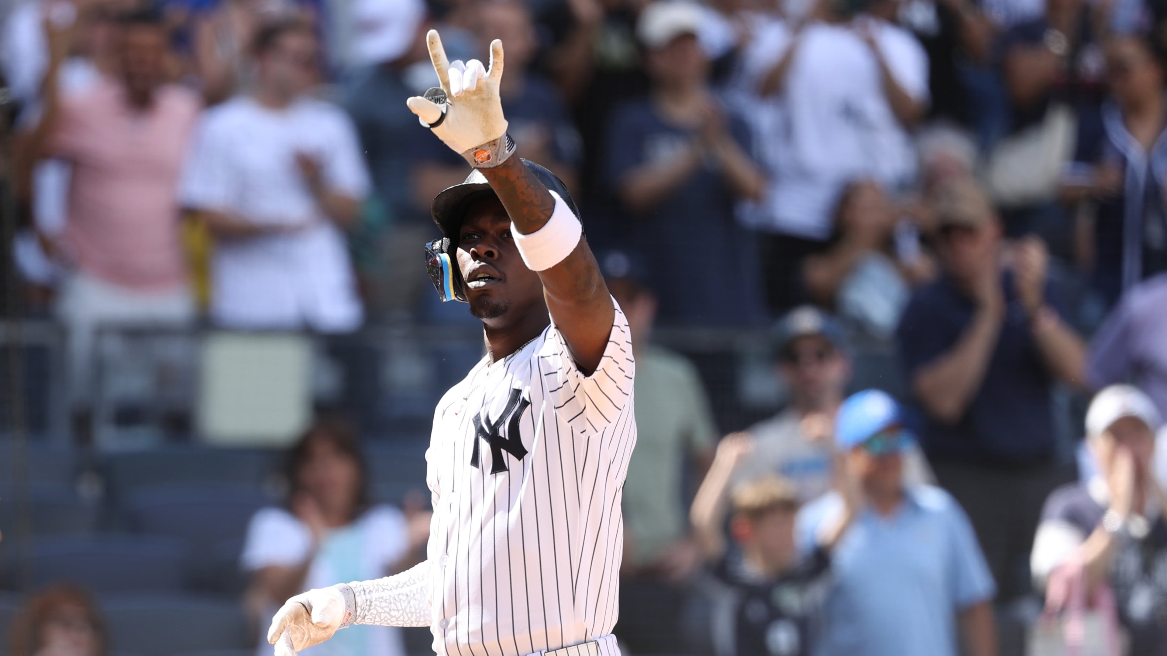 New York Yankees' Jazz Chisholm Jr. reacts after hitting a three-run home run, leading Trent Grisham and Anthony Volpe to also score, during the eighth inning of a baseball game against the Boston Red Sox, Sunday, June 7, 2026, in New York. (AP Photo/Pamela Smith)