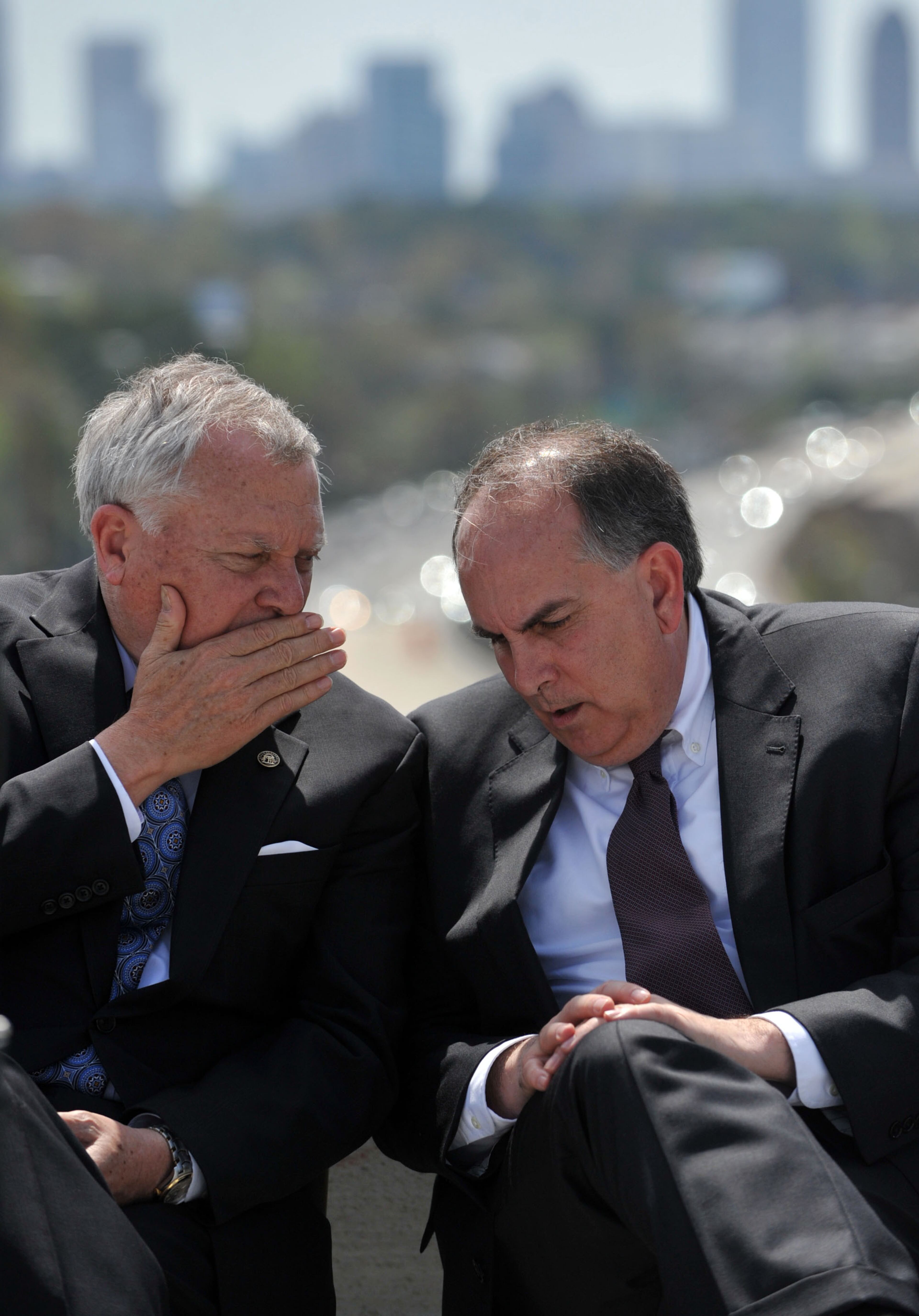 Governor Nathan Deal (left) talks with State Rep Edward Lindsey during the program. Deal and other state and local leaders conducted a brief ribbon-cutting celebration of the opening of the new flyover ramps Wednesday, April 2, 2014. The ramps provide I-85 southbound traffic with direct access to GA 400 northbound and also give GA 400 southbound motorists a direct ramp to I-85 northbound.