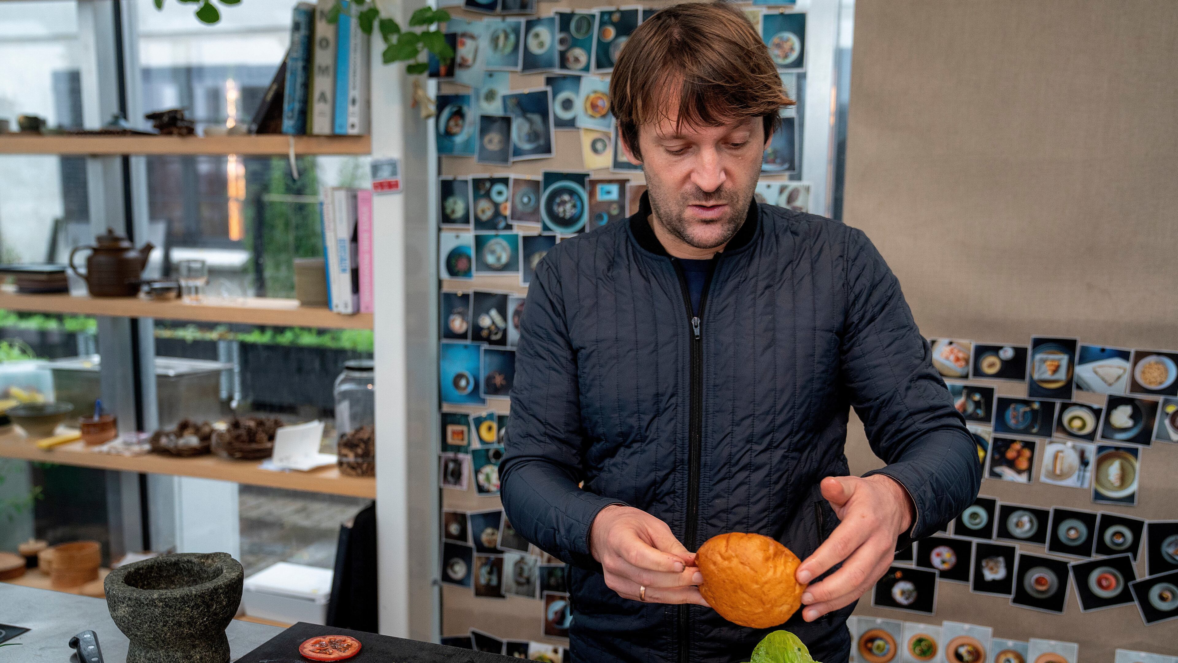 Noma's chef René Redzepi prepares a vegetarian burger in a restaurant, in Copenhagen, Nov. 24, 2024. (Soeren Bidstrup/Ritzau Scanpix via AP)
