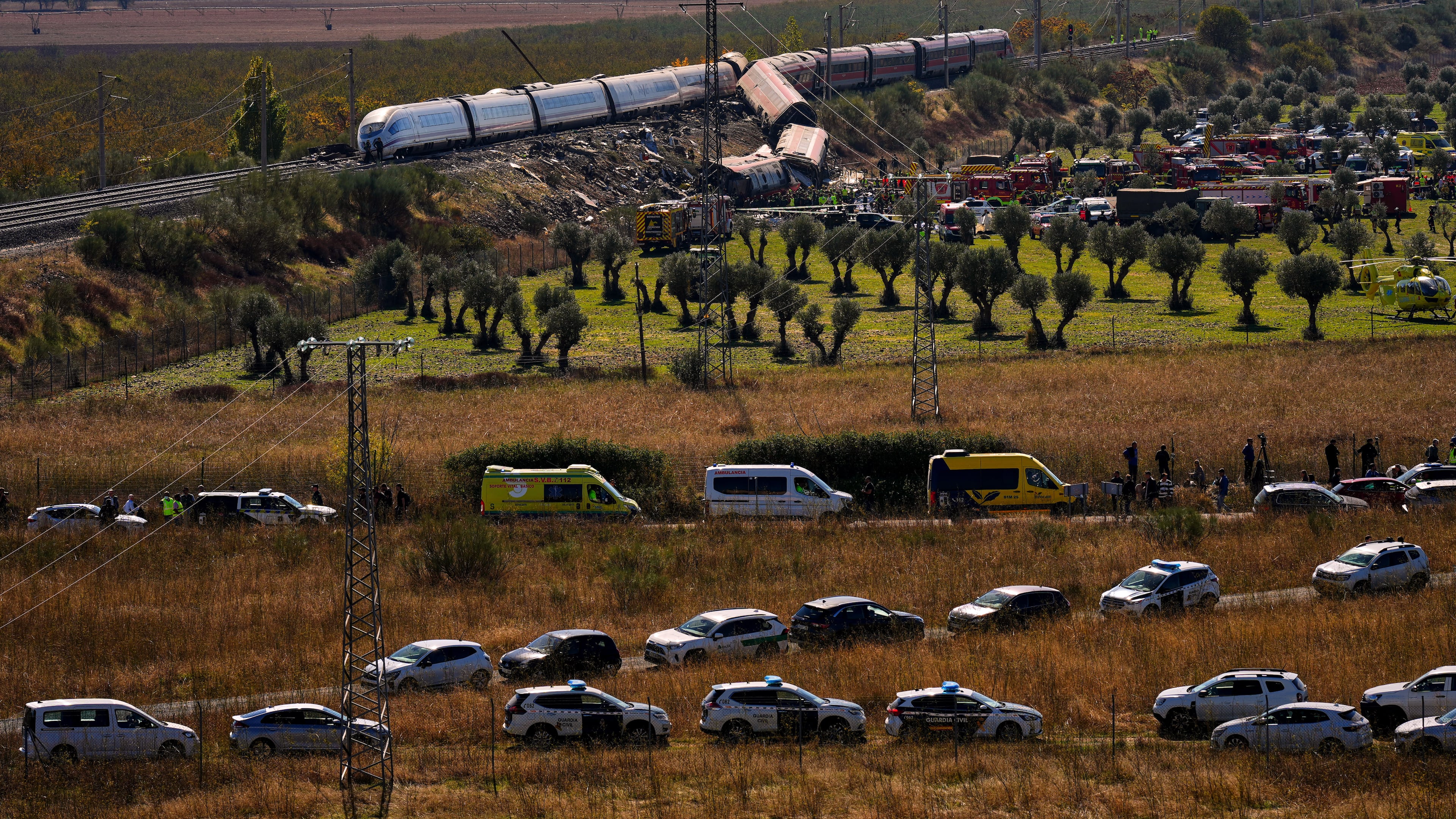 Emergency services work at the scene of a collision between two trains in Urda, Spain, on Wednesday, Oct. 28, 2026. (AP Photo/Manu Fernandez)