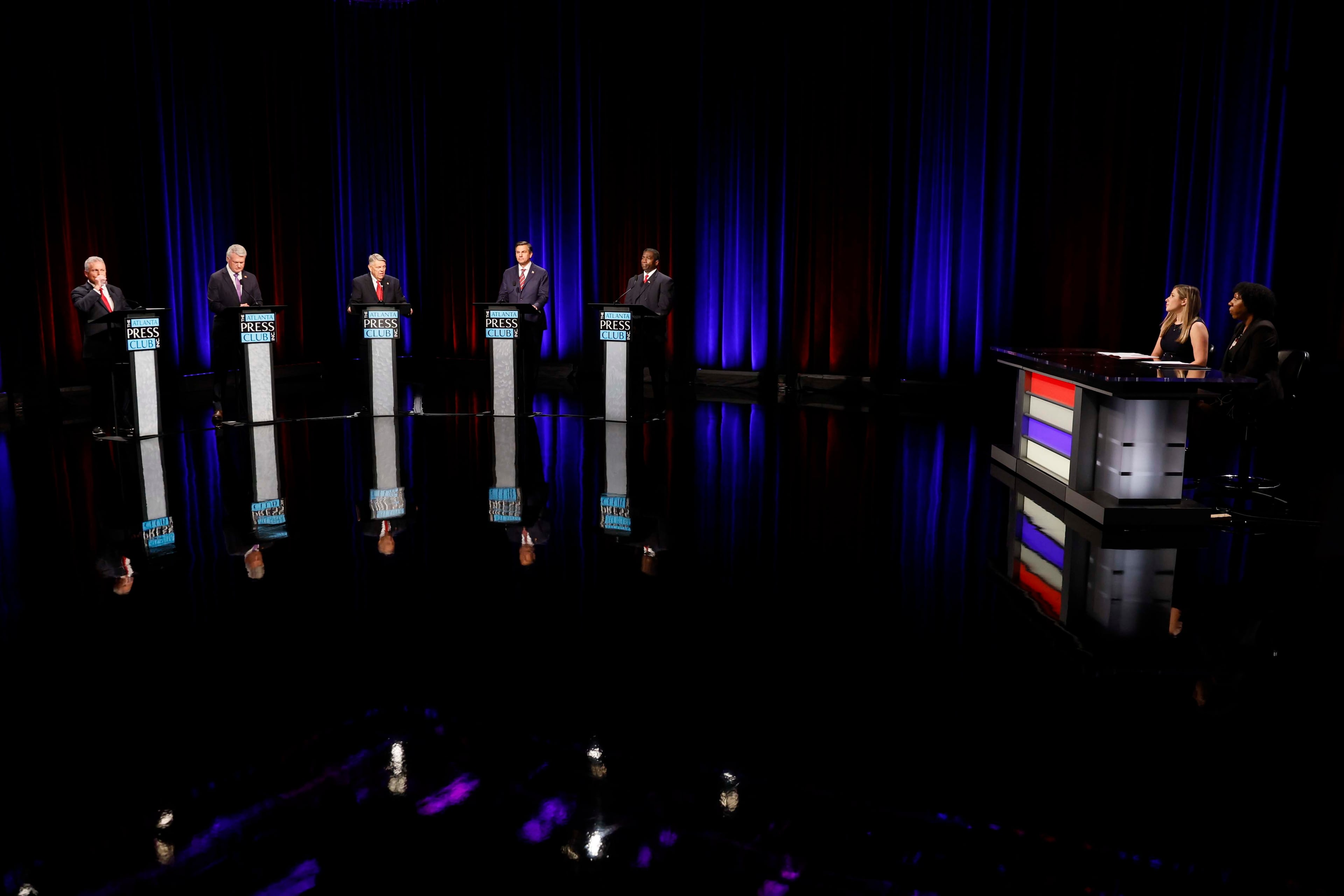 Georgia's Republican candidates for the U.S. Senate include (from left): Buddy Carter, Mike Collins, John Coyne, Derek Dooley and Jonathan McColumn. They participated in an Atlanta Press Club debate on Sunday. (Miguel Martinez/AJC)
