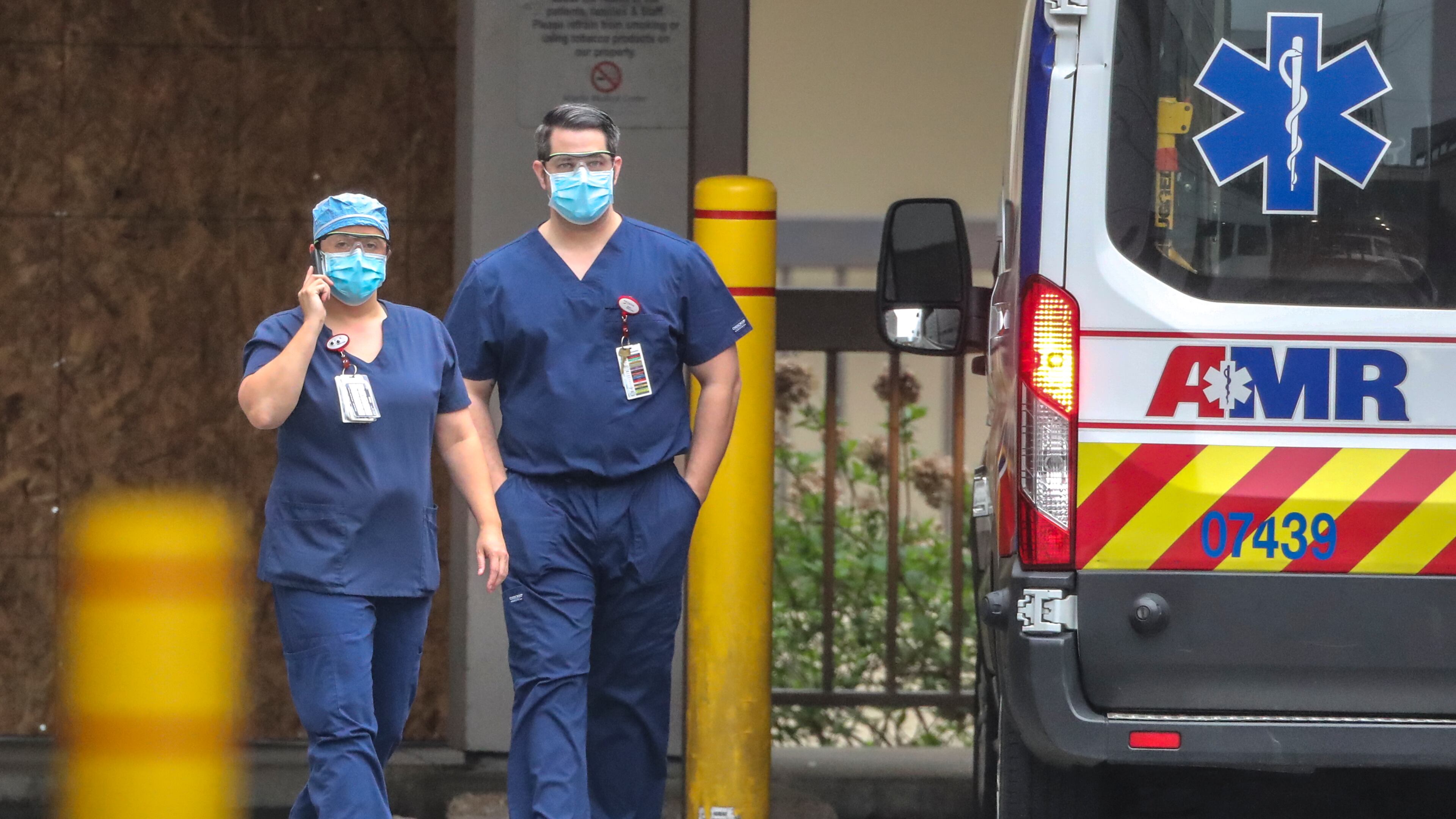 April 8, 2020 Atlanta: Medical workers at WellStar Atlanta Medical Center at 303 Parkway Dr NE in Atlanta walk outside the Emergency Room on Wednesday, April 8, 2020. While EMS agencies say they are doing their best to protect their crews, they say they are not getting resources provided to other health care providers to help respond to the crisis. As a result, concerns are rising to a fever pitch that so many medics will become sick or ordered into isolation that there wonât be enough left to respond to emergency calls. In Georgia, two dozen state EMS workers have been quarantined just since Tuesday. In the past few weeks, some ambulance providers say that dozens of medics have been quarantined but only a handful have tested positive for the disease, including some in south Fulton. But other paramedics who contacted the AJC said they had also contracted the infection but did not want to be identified for fear of losing their jobs. Gov. Brian Kemp said Wednesday he would extend Georgiaâs public health emergency through May 13, granting him more time to use extraordinary powers to suspend laws and impose other restrictions to contain the coronavirus pandemic. The extension prolongs the governorâs authority to take âdirectâ control of civil staffers, restrict travel, limit public gatherings and institute a range of other measures to combat the disease. JOHN SPINK/JSPINK@AJC.COM
