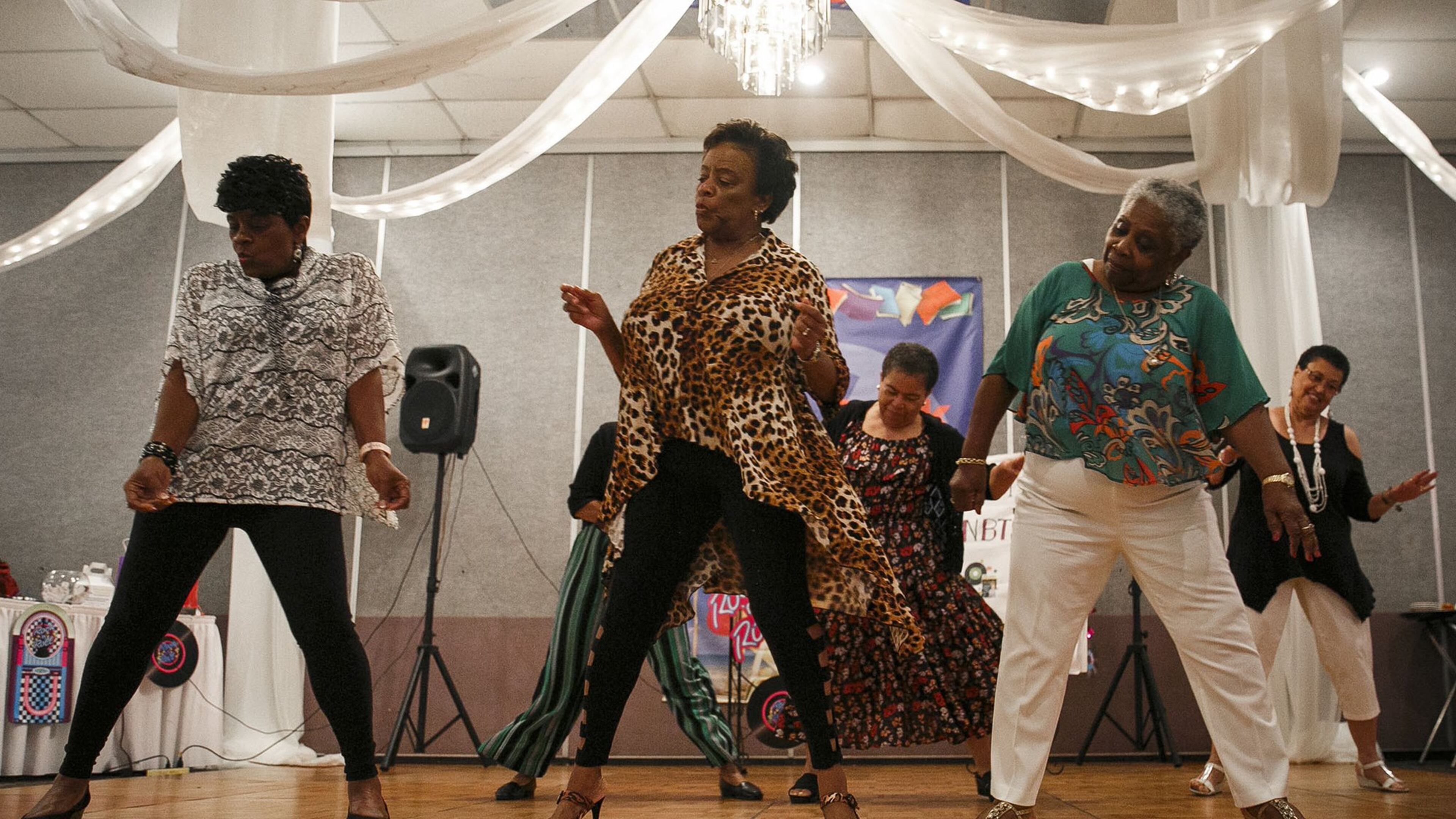 From left to right, Patricia Wyche, Corenthia Picou and Eunice Sample dance to “Bikers Shuffle” by Big Mucci during the Not Back to School luncheon held at Grand Affairs in Virginia Beach, Va., on Tuesday, September 3, 2019. All three ladies retired from Norfolk Public Schools with over 35 years of service. (Kristen Zeis/Virginian Pilot/TNS)