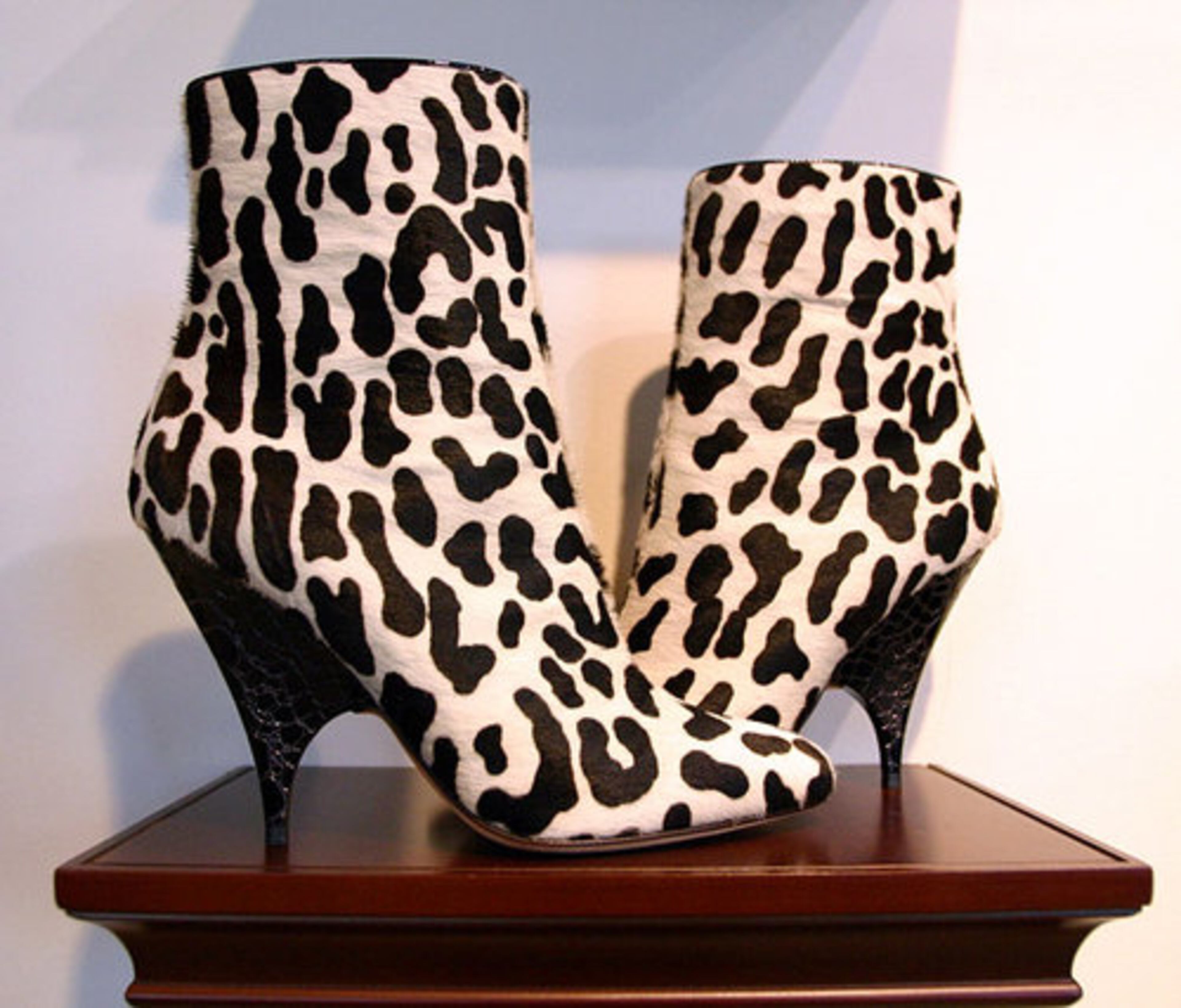 A WEAKNESS: "Shoes, bien sur! This is a true weakness. A woman can never have too many pairs of shoes. Mine all have a purpose. In the morning, I often dress around the pair I feel like wearing that day. It's definitely a love story." Pictured are Blanco's white leopard shoes by Giuseppe Zanotti.