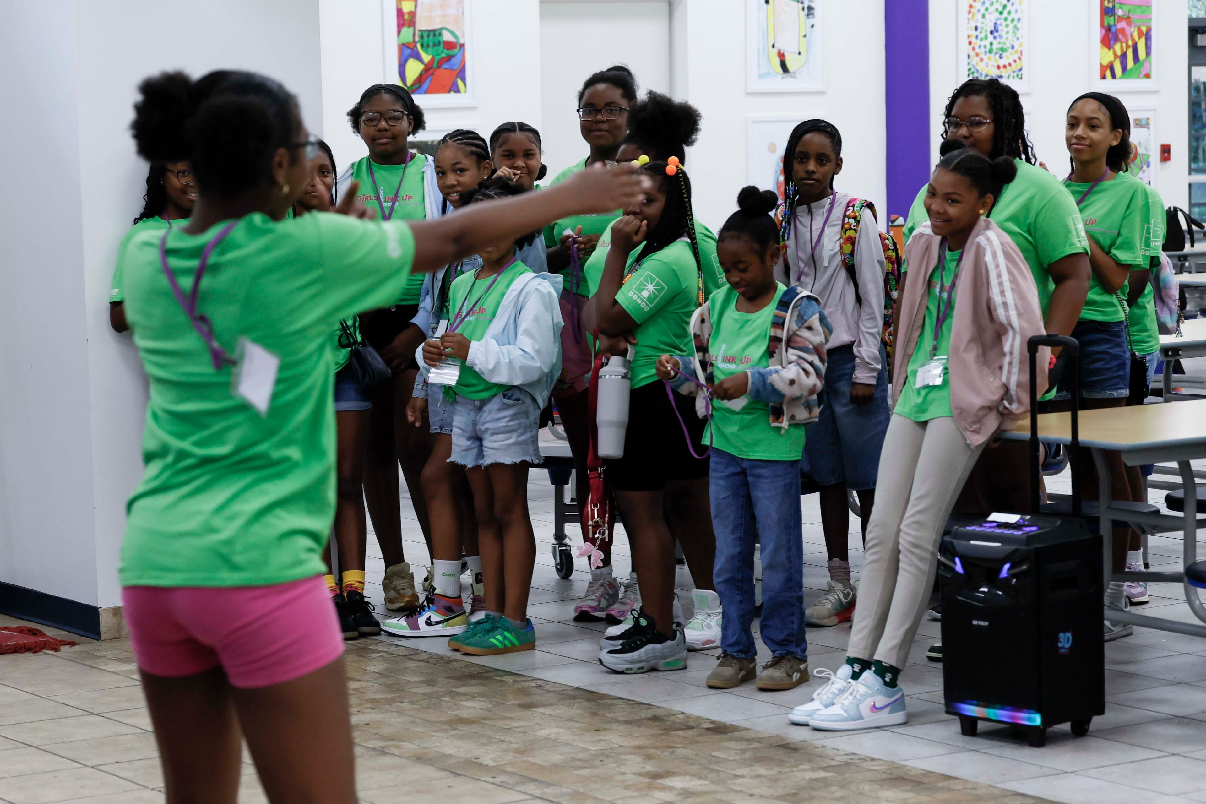Students participate in warm-up activities before classes start during an introduction activity on the first day of the 3D Girls summer camp at Ethos Classical Middle School on Monday, June 1, 2026.
(Miguel Martinez/AJC)