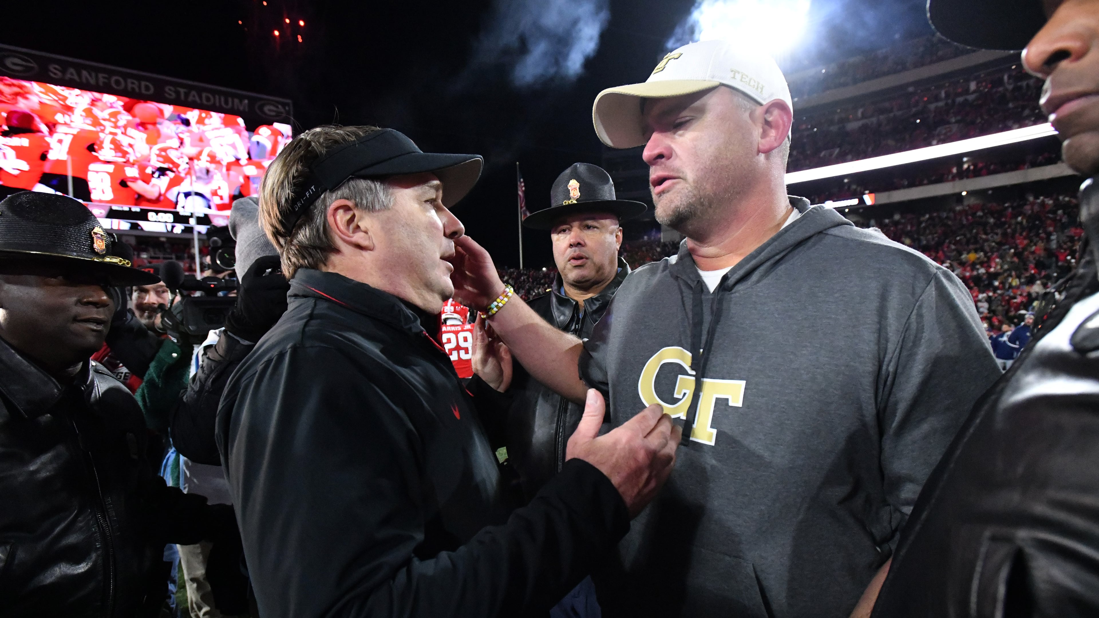 Kirby Smart (left) and Georgia beat Brent Key and Georgia Tech 44-42 in eight overtimes last November in Athens. The Bulldogs and Yellow Jackets bring Clean Old-Fashioned Hate off campus for 2025, playing at 3:30 p.m. Friday at Mercedes-Benz Stadium in Atlanta. (Hyosub Shin/AJC 2024)
