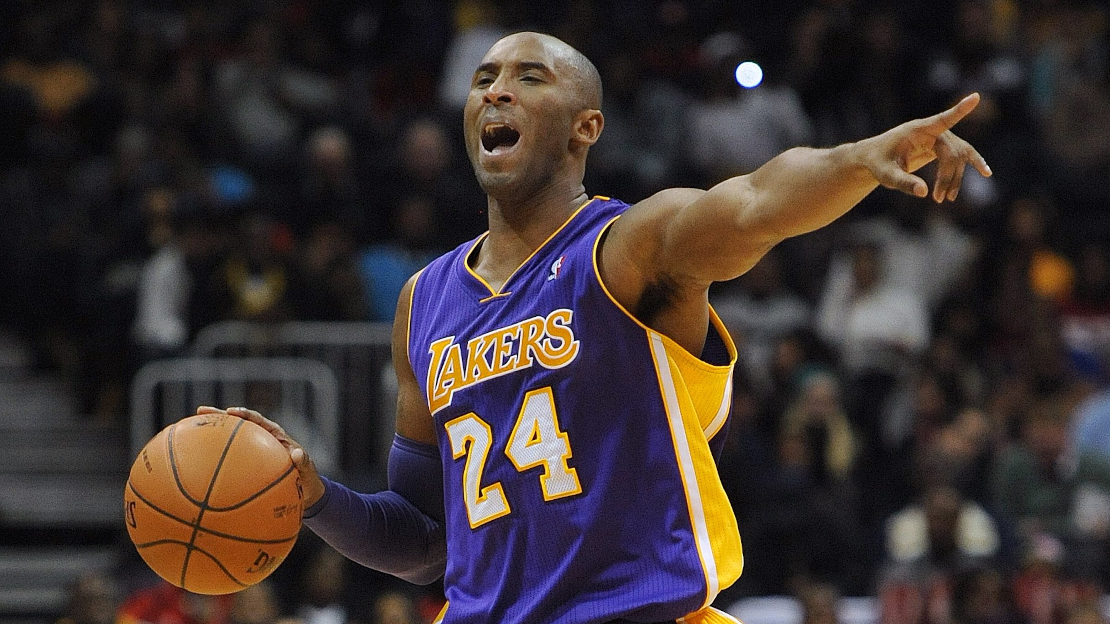 Los Angeles Lakers Kobe Bryant (24) gives instructions to his teammates during the Atlanta Hawks vs the L.A. Lakers basketball game in Philips arena on Monday, December 16, 2013. The Atlanta Hawks won the game 114 to 100. JOHNNY CRAWFORD / JCRAWFORD@AJC.COM