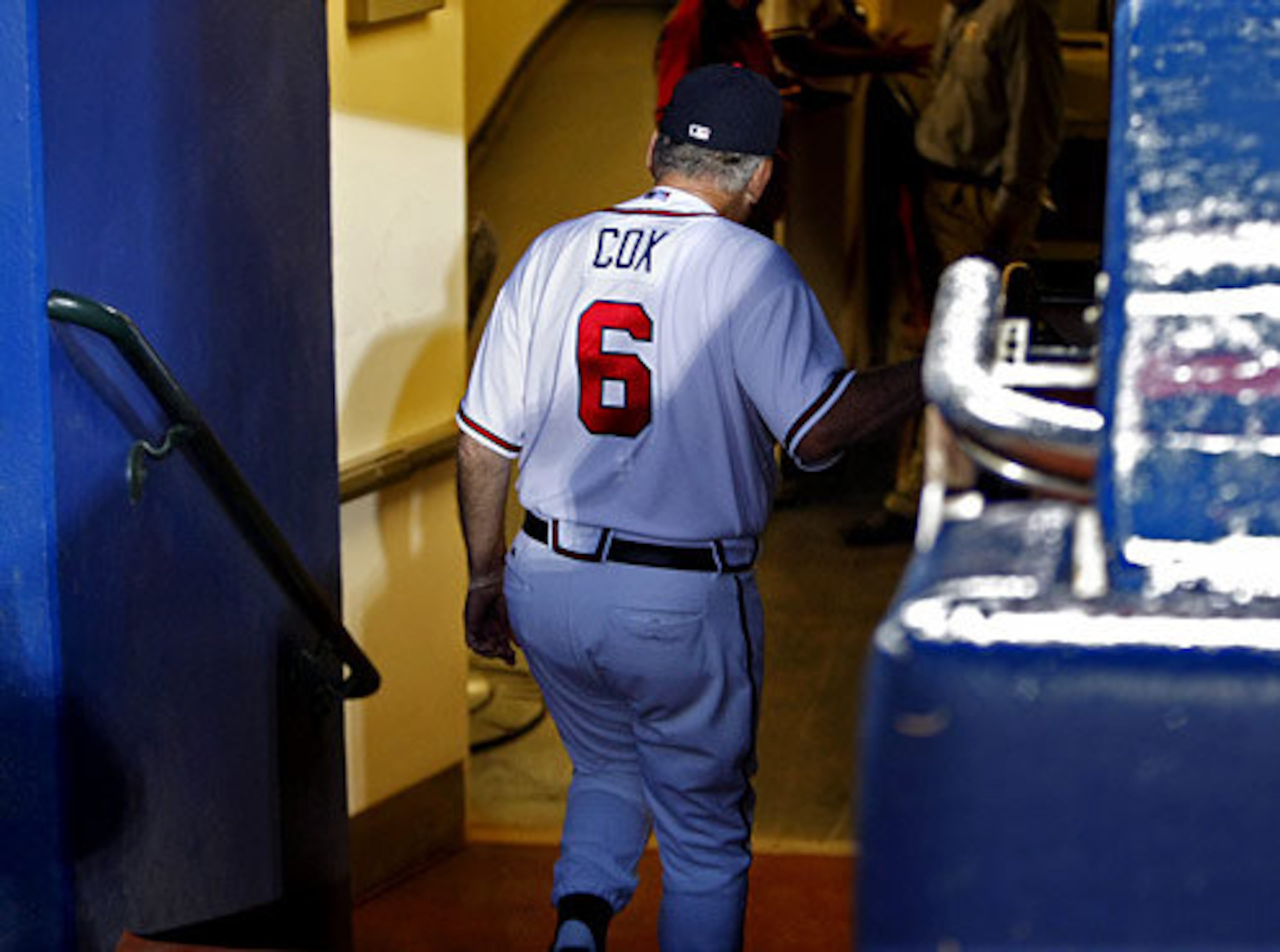 Braves manager Bobby Cox leaves the field after a 2010 game during his final season before retirement.(Curtis Compton/AJC file)