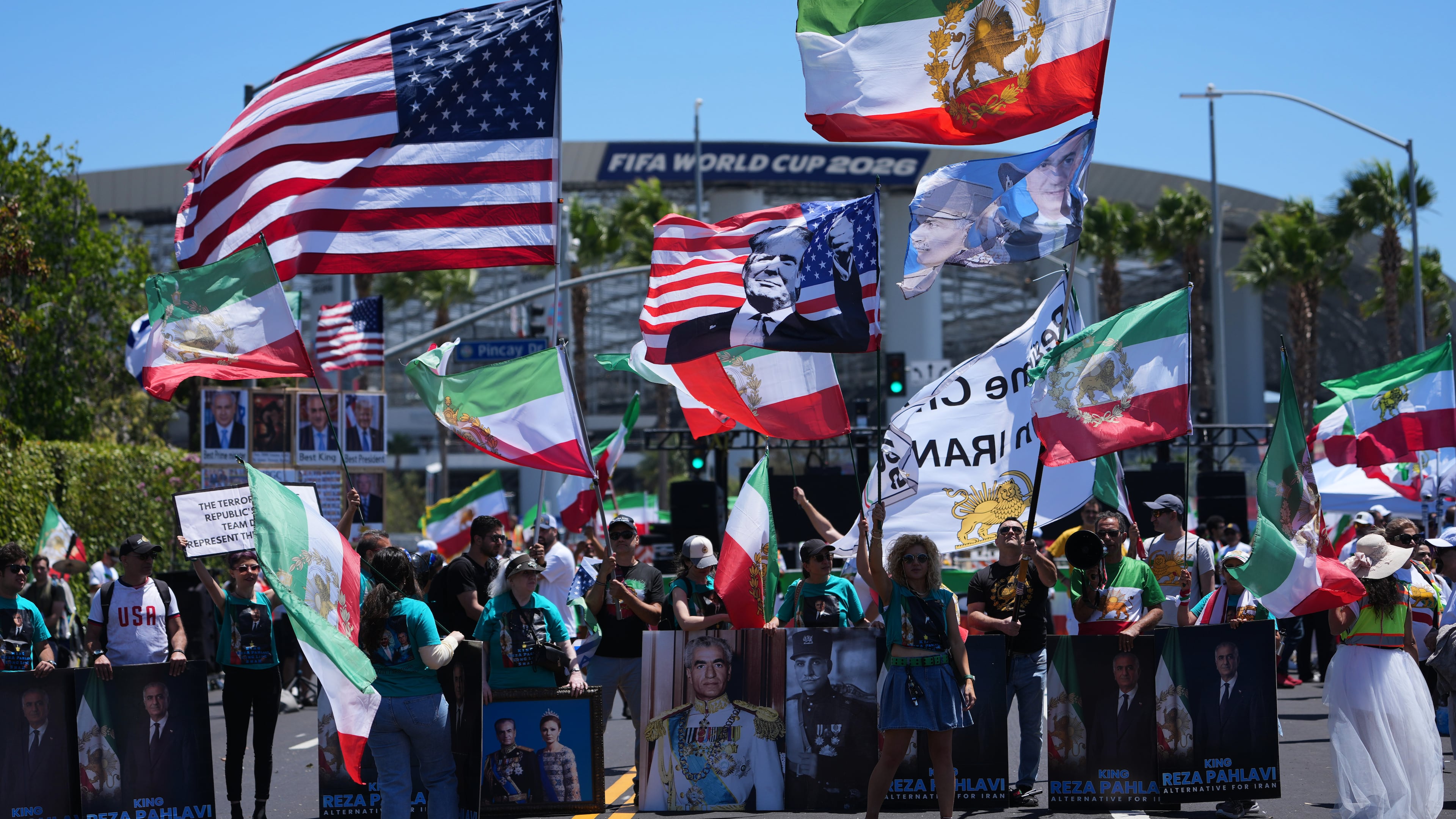 People protest outside Los Angeles Stadium before the World Cup Group G soccer match between Iran and New Zealand in Inglewood, Calif., near Los Angeles, Monday, June 15, 2026. (AP Photo/Jae C. Hong)