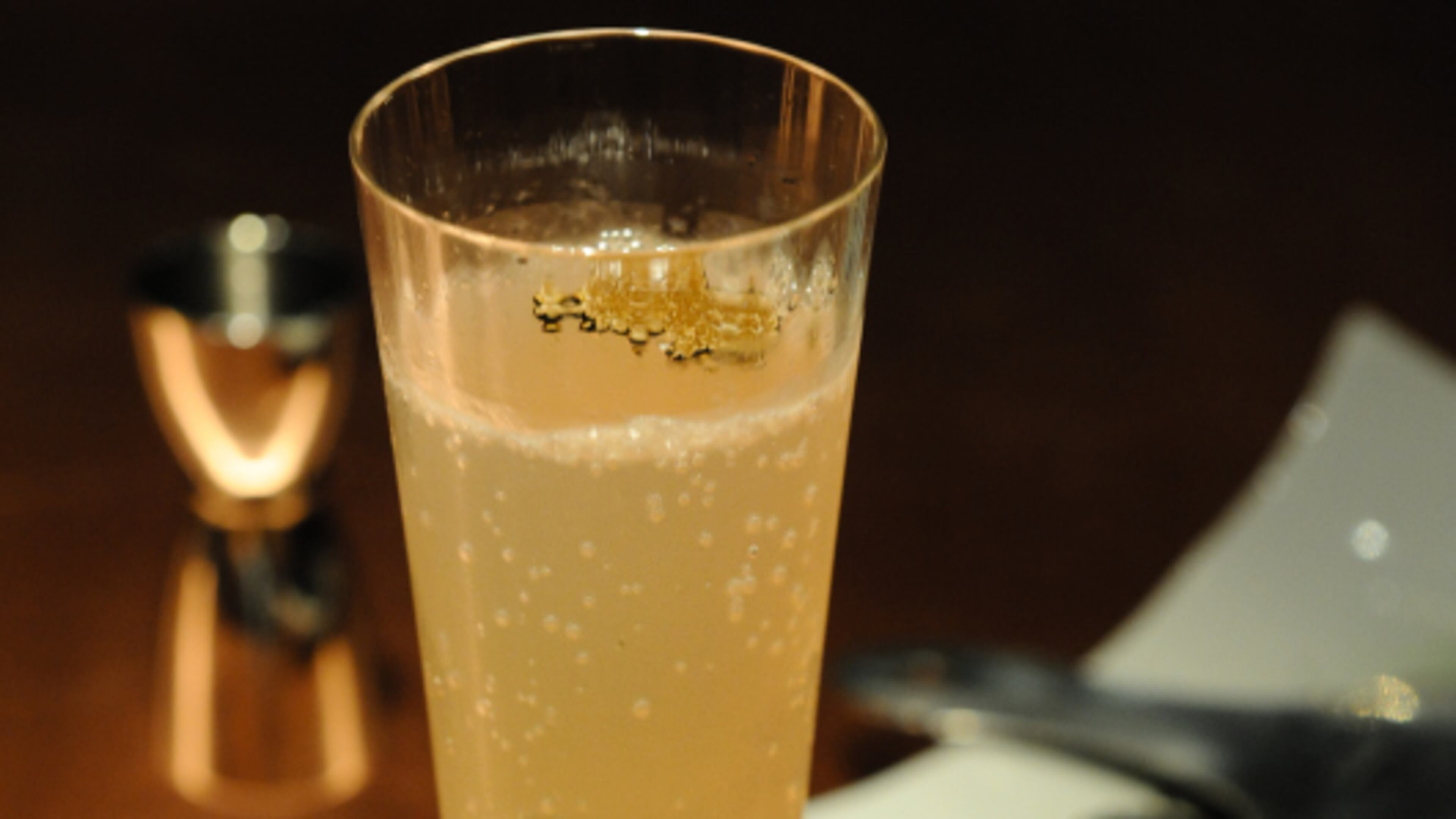 Himitsu Toryufu cocktail made with pear-infused vodka, sweetened with white truffle honey and served in a flute with a thin slice of black truffle for garnish. (BECKY STEIN PHOTOGRAPHY.COM)