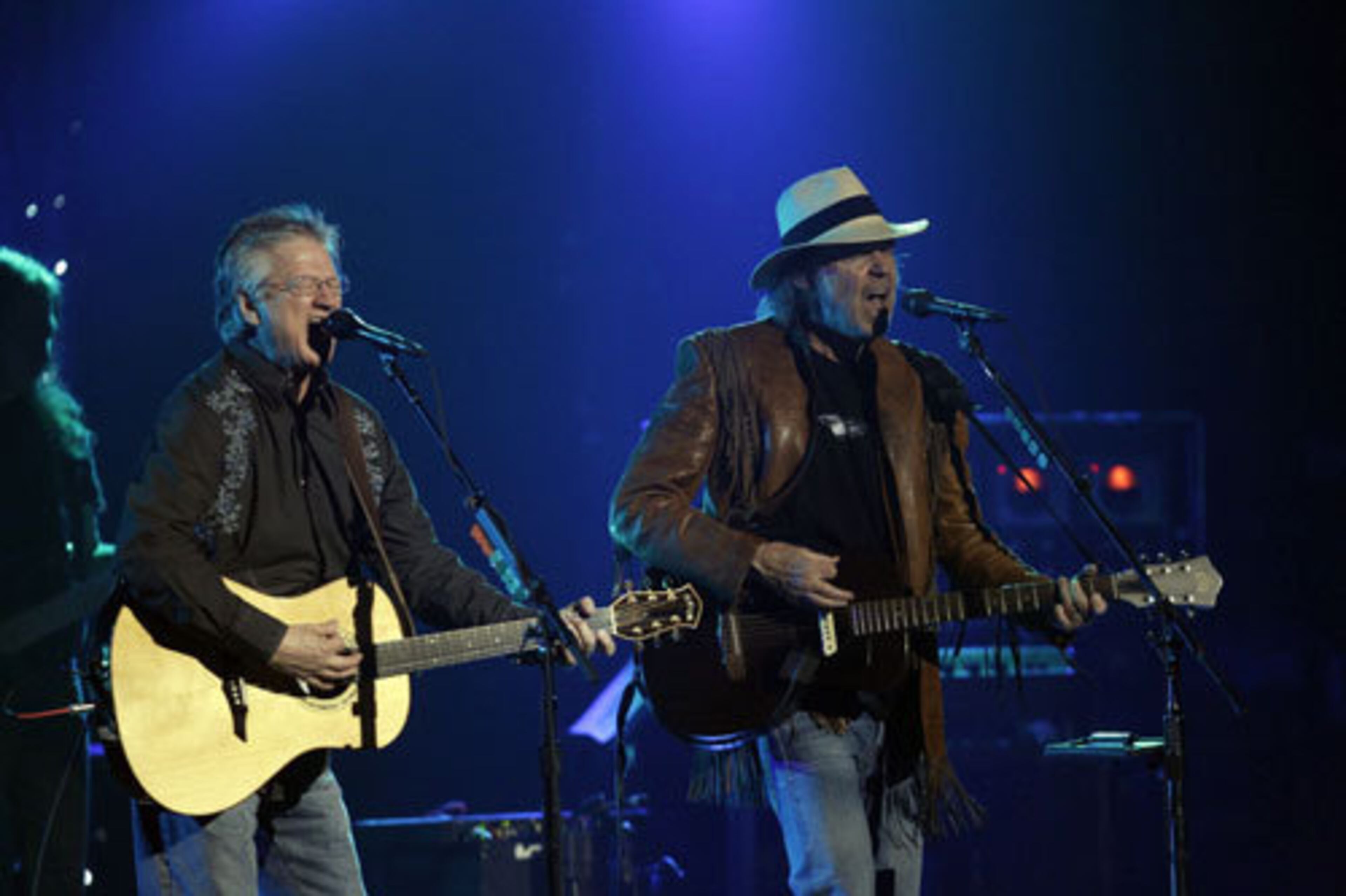 Buffalo Springfield's Richie Furay, left, and Neil Young perform. Lyrics Young sang on his 2000 song "Buffalo Springfield Again" revealed his wish to one day reunite with the band and to "see those guys again and give it a shot."