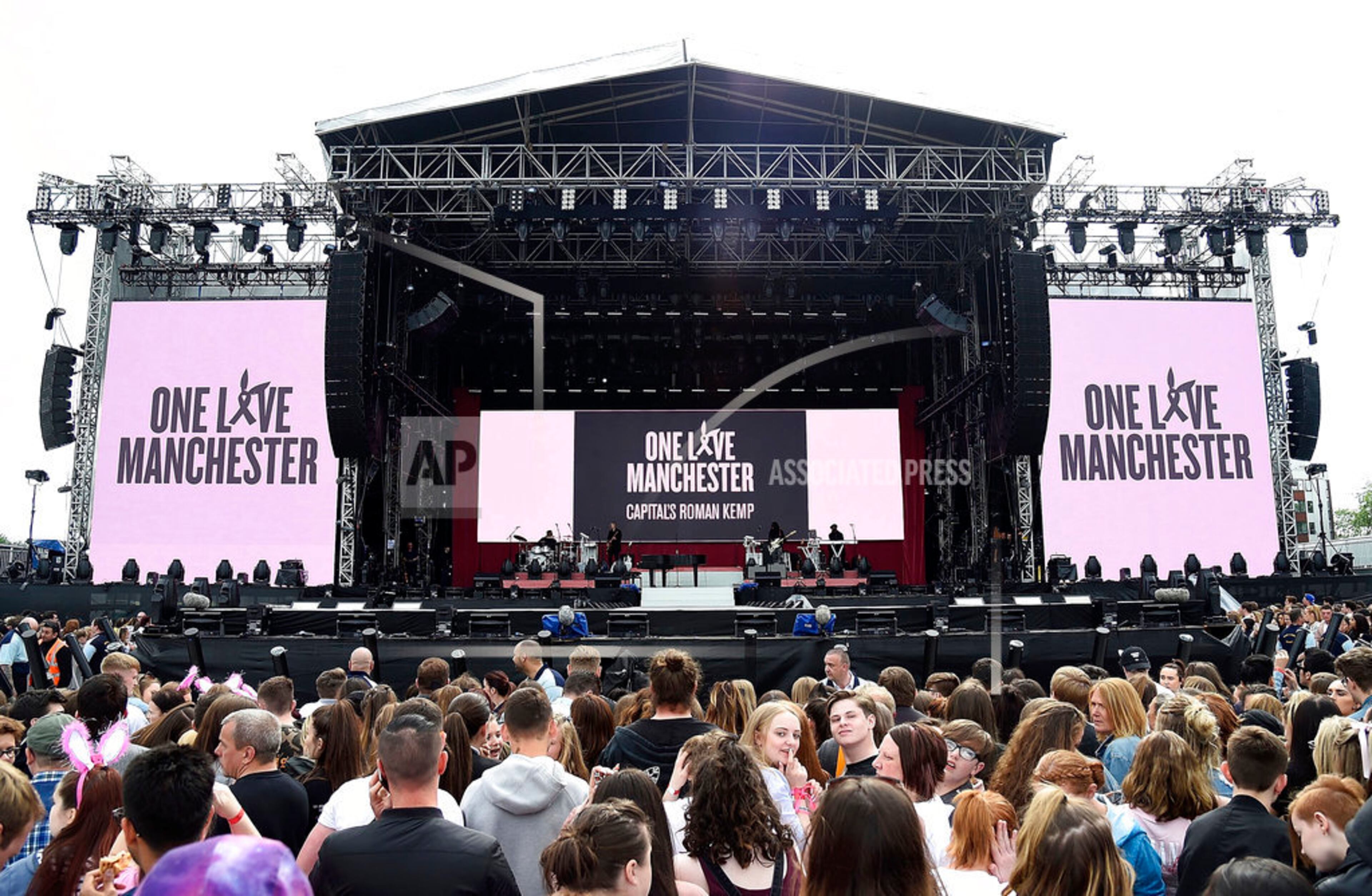 In this Sunday, June 4, 2017, handout photo provided by Kevin Mazur for One Love Manchester, a general view of the stage at the One Love Manchester tribute concert in Manchester, north western England, Sunday, June 4, 2017. One Love Manchester is raising money for those affected by the bombing at the end of Ariana Grande's concert in Manchester on May 22, 2017. (Kevin Mazur via AP)