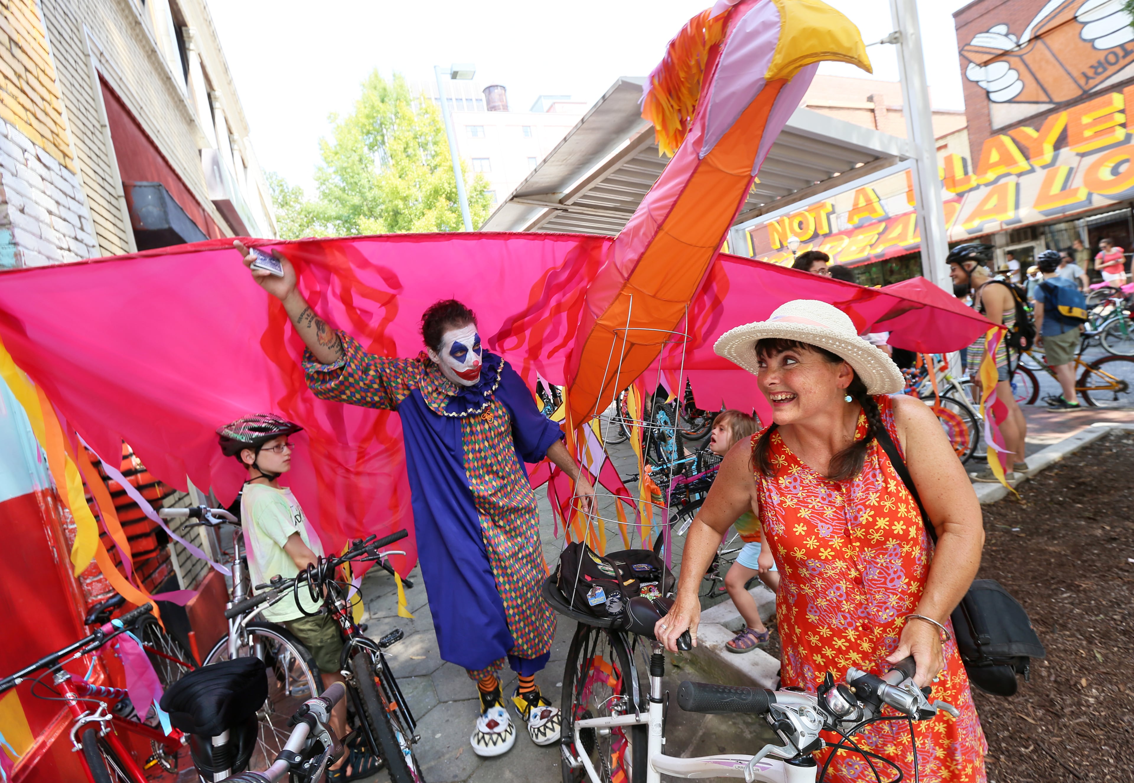 Chantelle makes her way to the front of the pack to lead the Great Atlanta Bicycle Parade down Peachtree Street last month. She organizes four bike parades a year for the Atlanta Bicycle Coalition's Atlanta Streets Alive events.