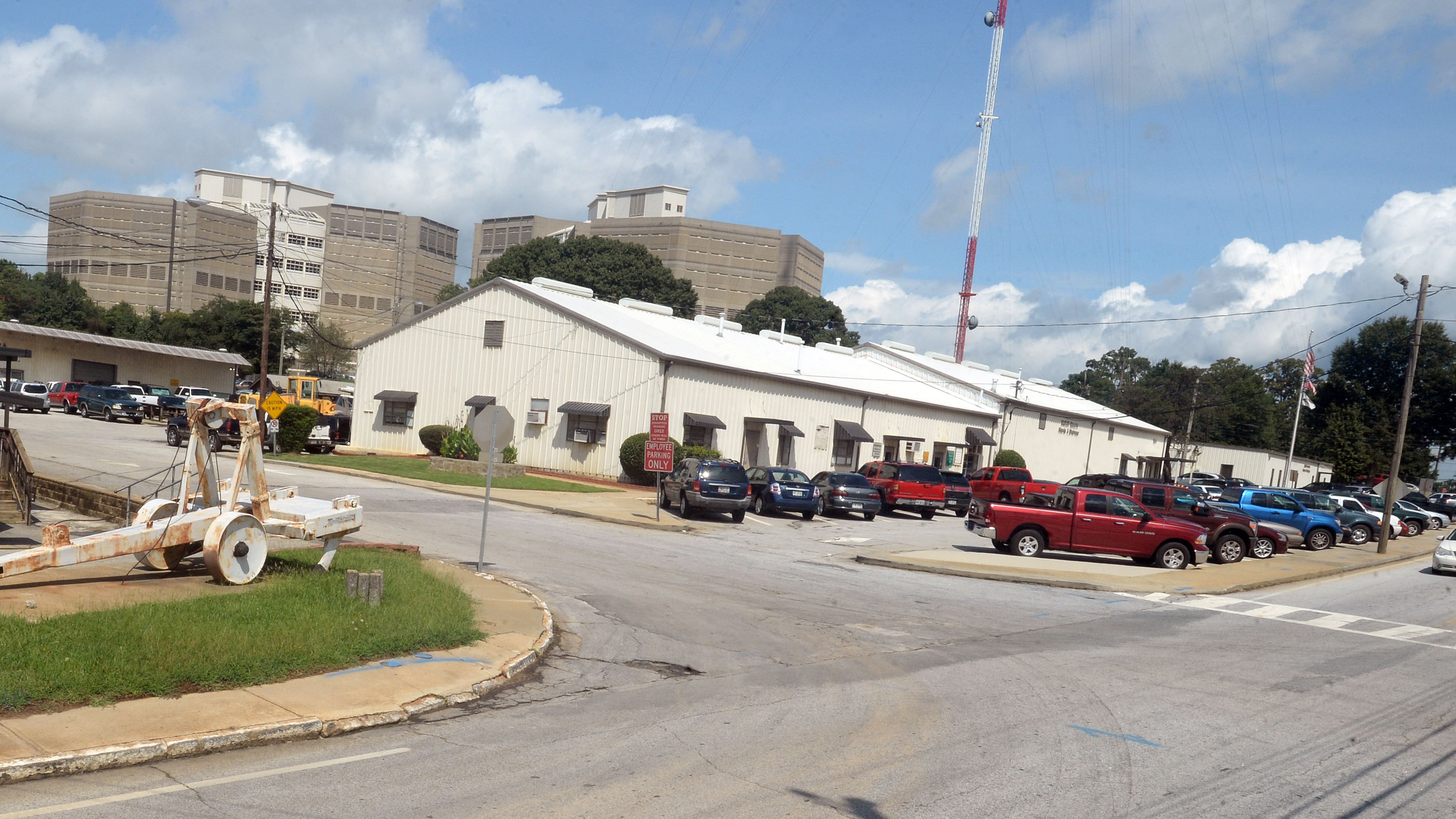 DeKalb County’s service buildings and equipment near the county jail will be displaced by Atlanta United’s new soccer practice complex. KENT D. JOHNSON /KDJOHNSON@AJC.COM