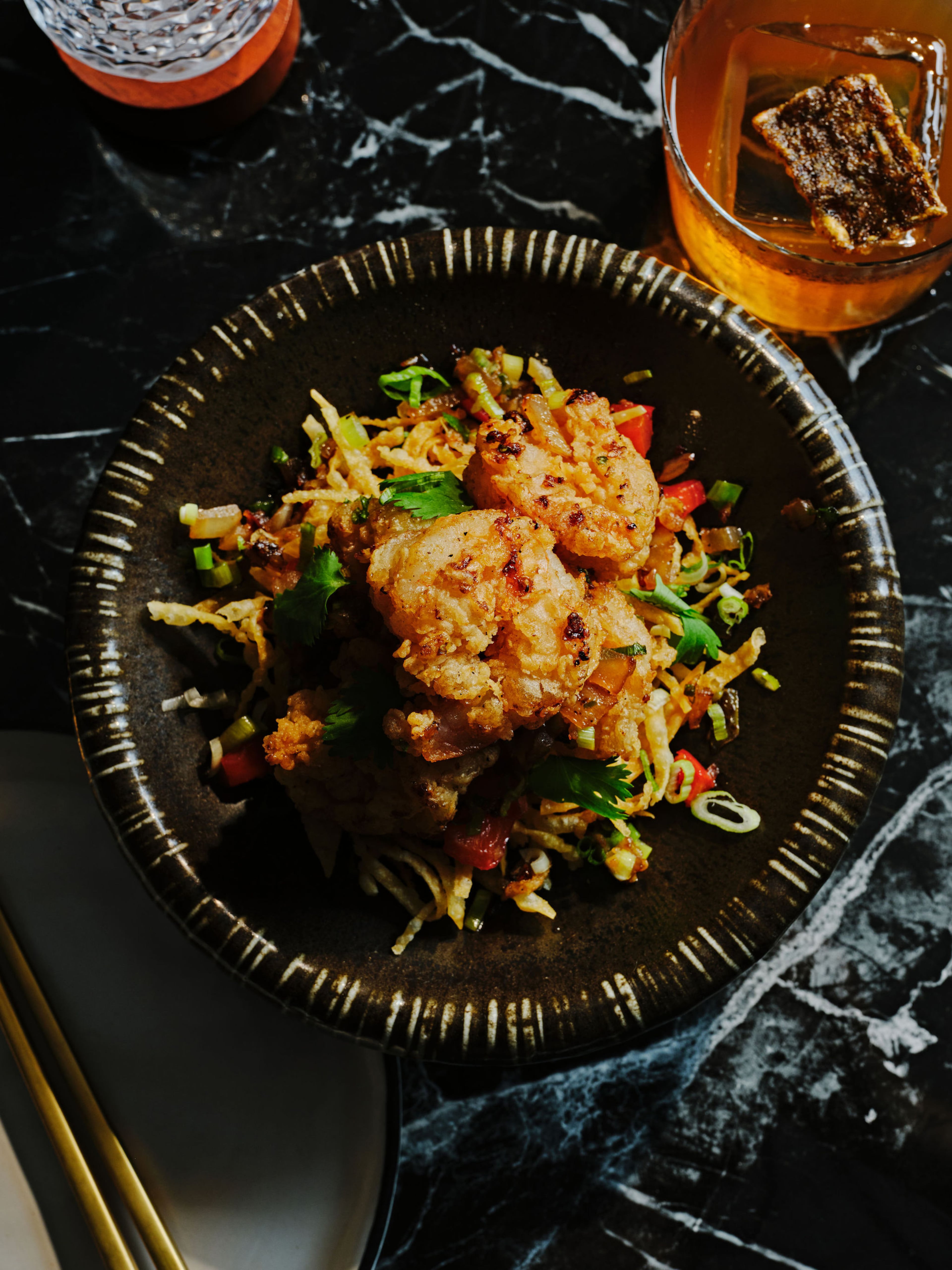 The salt and pepper shrimp at Blackjack Bar Tapas were juicy and well-seasoned. (Courtesy of Andrew Thomas Lee/Blackjack Bar Tapas)