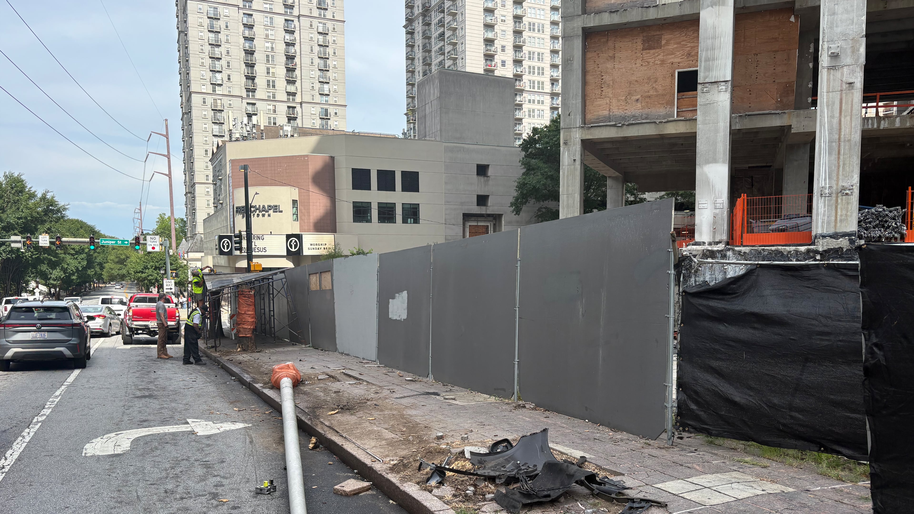 The collapsed scaffolding prompted speculation and questions on social media and among Midtown residents. (Zachary Hansen/AJC)