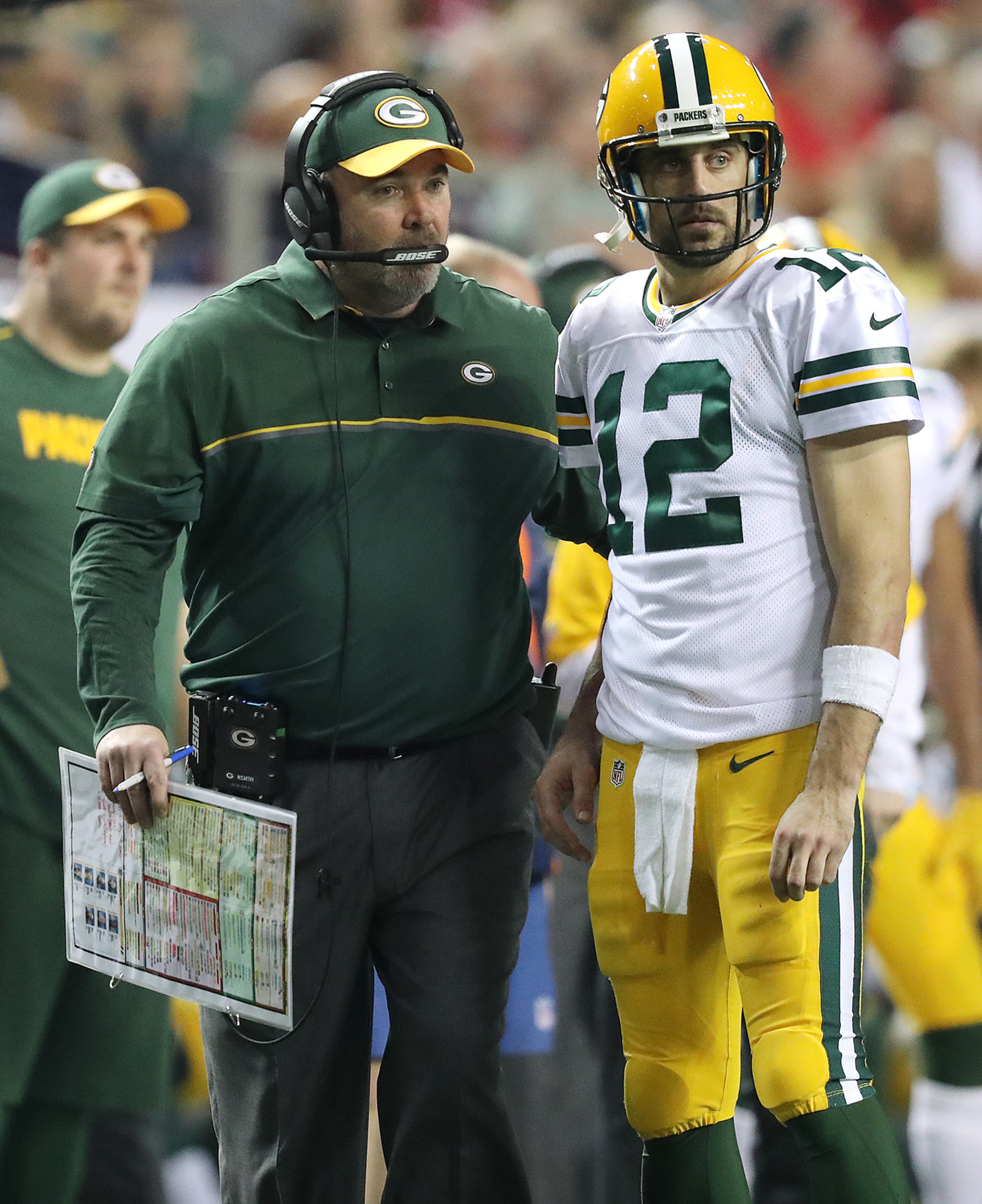 October 30, 2016 ATLANTA: Packers head coach Mike McCarthy confers with Aaron Rodgers during the second half against the Falcons in an NFL football game on Sunday, Oct. 30, 2016, in Atlanta. Curtis Compton /ccompton@ajc.com