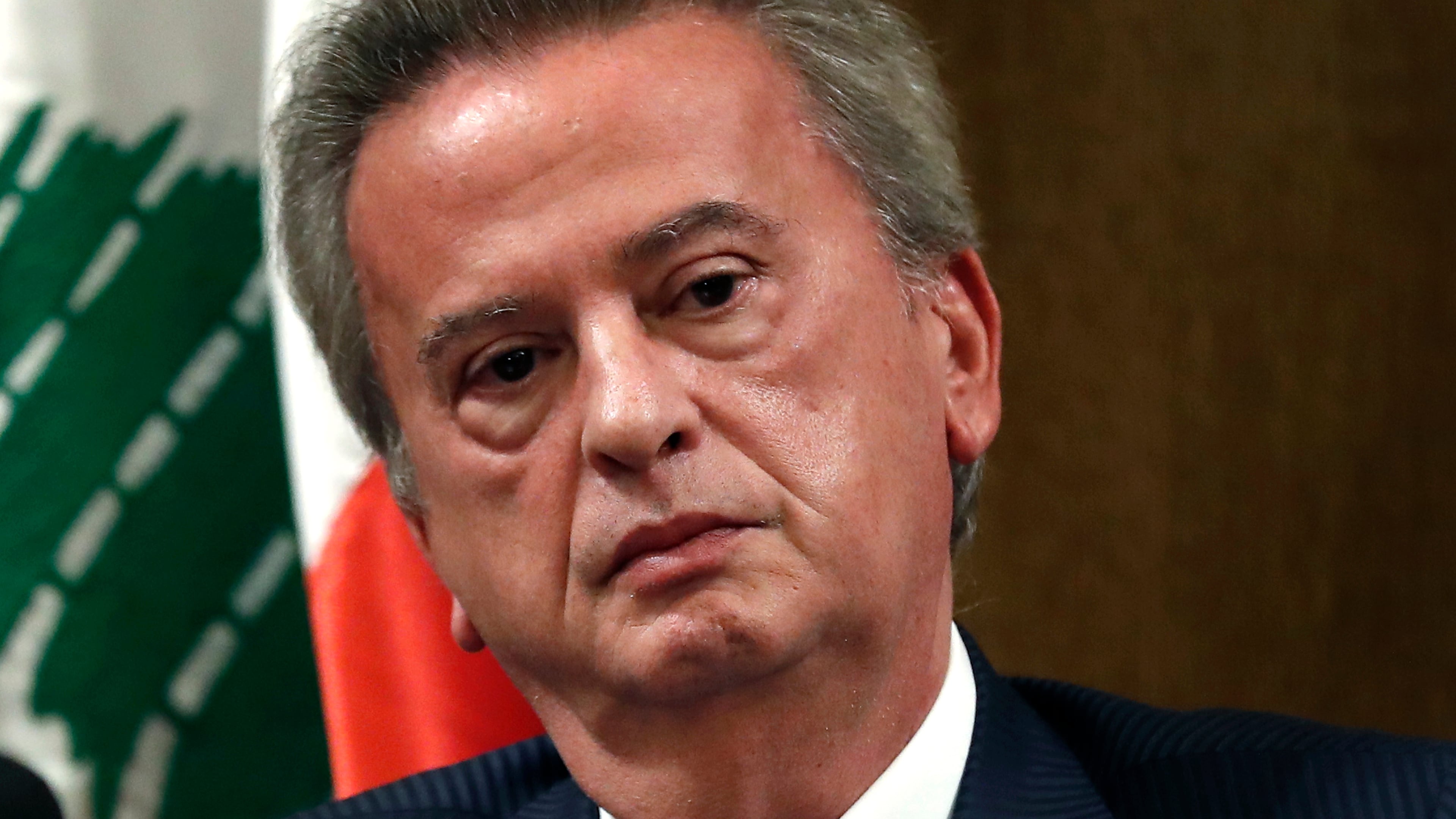 FILE - Then Lebanon's Central Bank governor Riad Salameh listens to a journalist's question during a press conference, in Beirut, Lebanon, Nov. 11, 2019. (AP Photo/Hussein Malla, File)