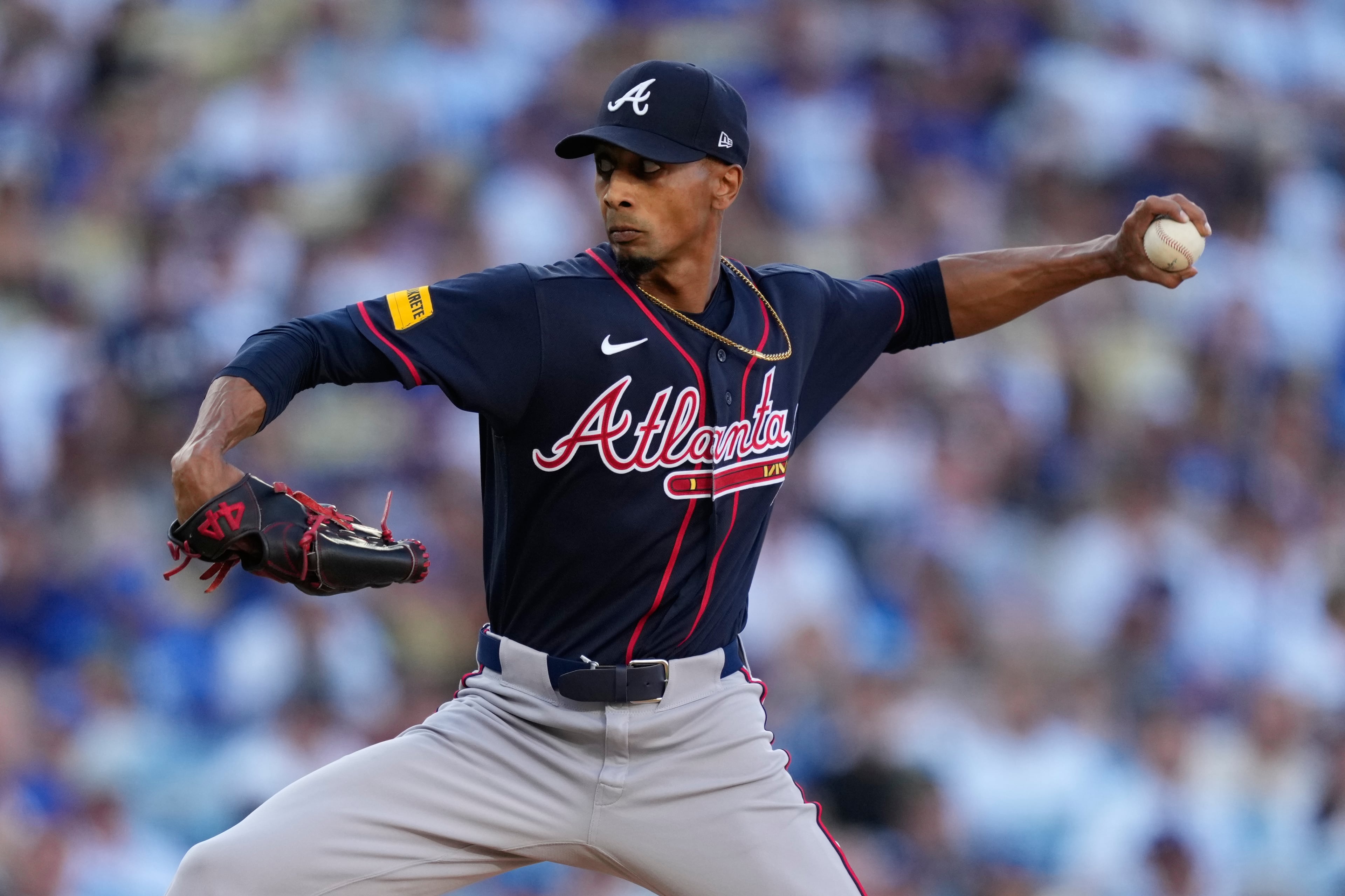 Atlanta Braves pitcher Ray Kerr throws against the Los Angeles Dodgers during the first inning of Game 2 of the National League Division Series on Sunday, Oct. 4, 2026. (Mark J. Terrill/AP)