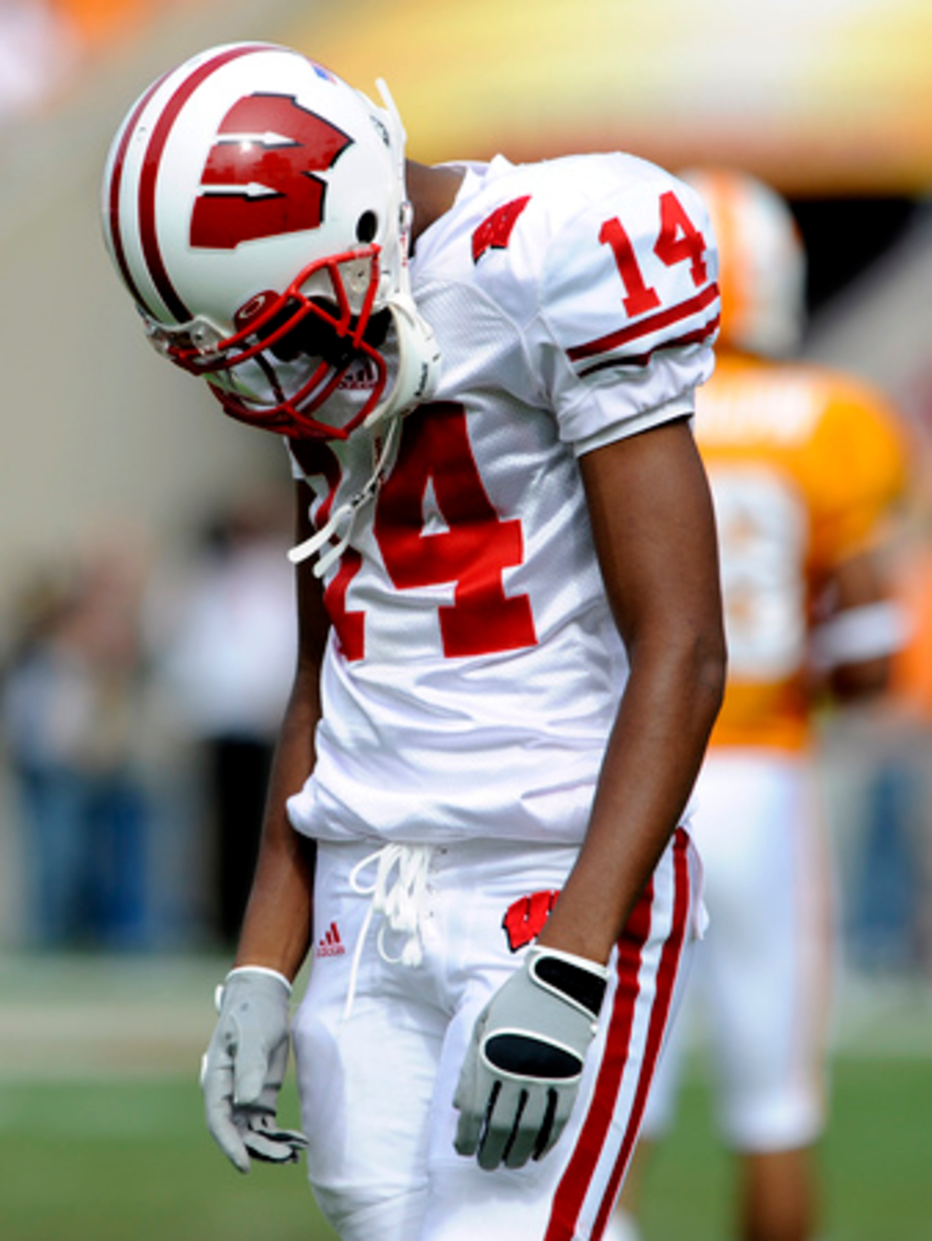 Wisconsin wide receiver Kyle Jefferson hangs his head after dropping a pass against Tennessee during the fourth quarter.