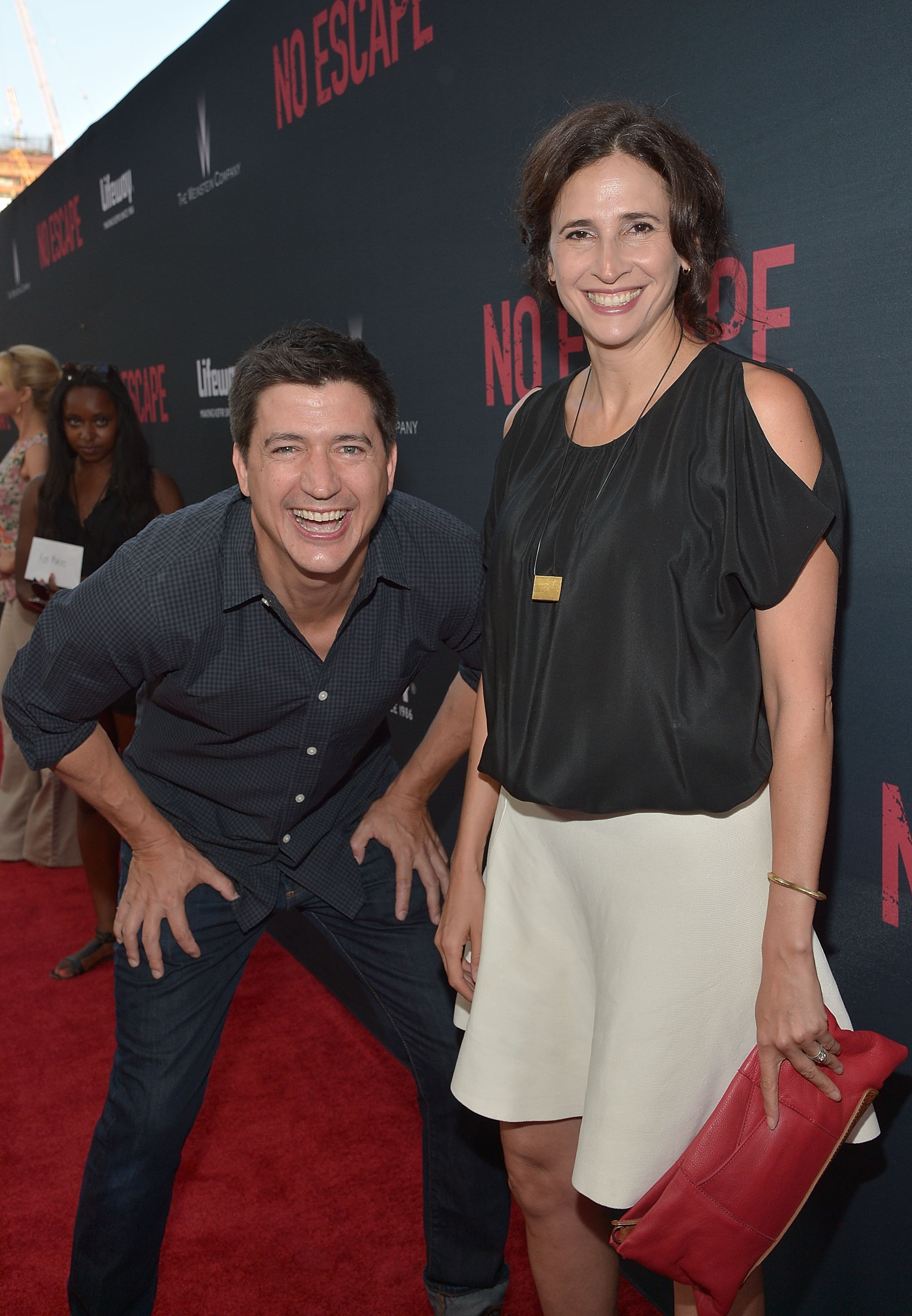 LOS ANGELES, CA - AUGUST 17: Actors Ken Marino and Michaela Watkins attend the premiere of the Weinstein Company's 'No Escape' at Regal Cinemas L.A. Live on August 17, 2015 in Los Angeles, California. (Photo by Charley Gallay/Getty Images for The Weinstein Company)
