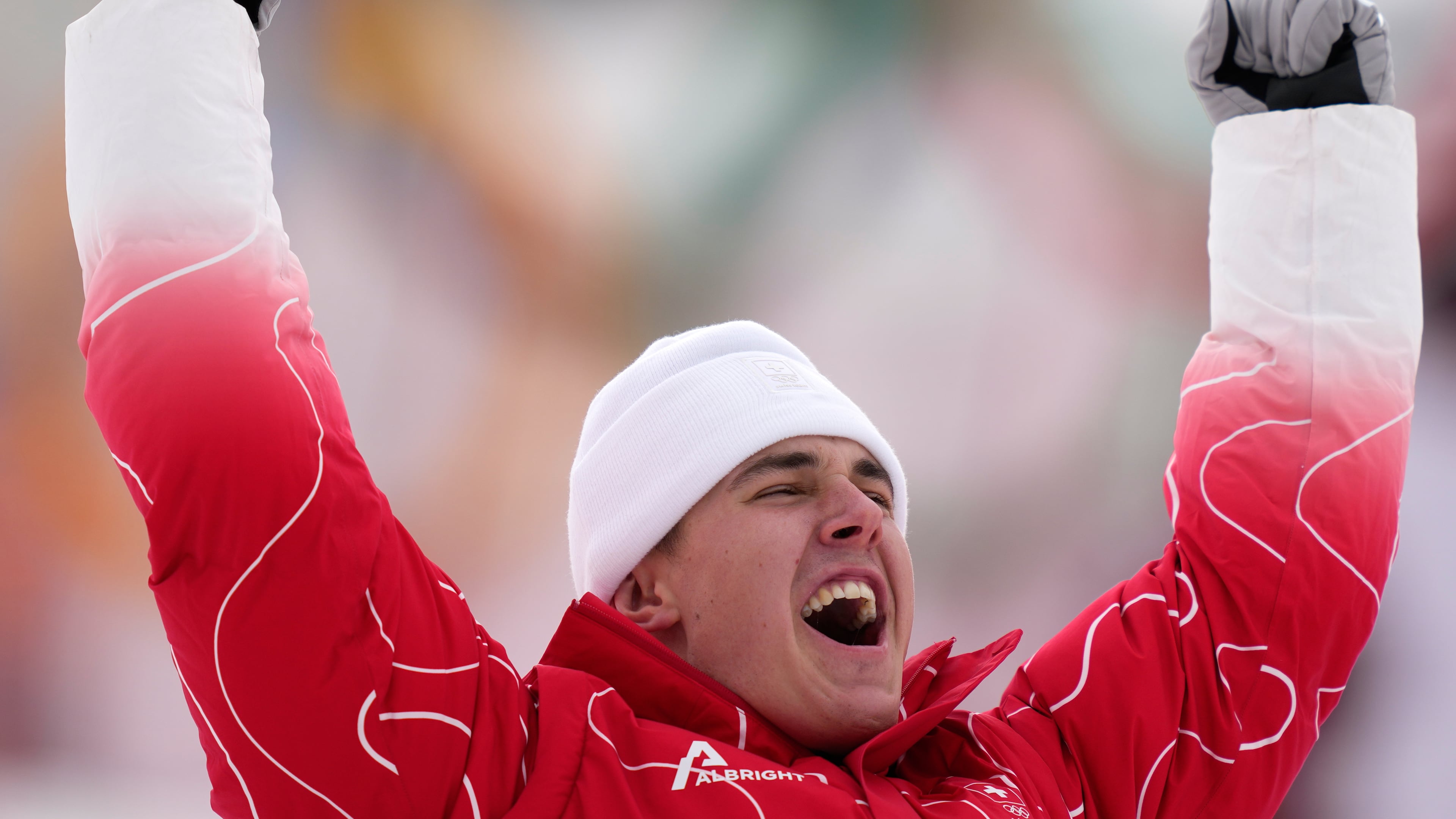 Switzerland's Franjo von Allmen celebrates winning the gold medal in a men's super-G race, at the 2026 Winter Olympics, in Bormio, Italy, Wednesday, Feb.11, 2026. (AP Photo/Julia Demaree Nikhinson)