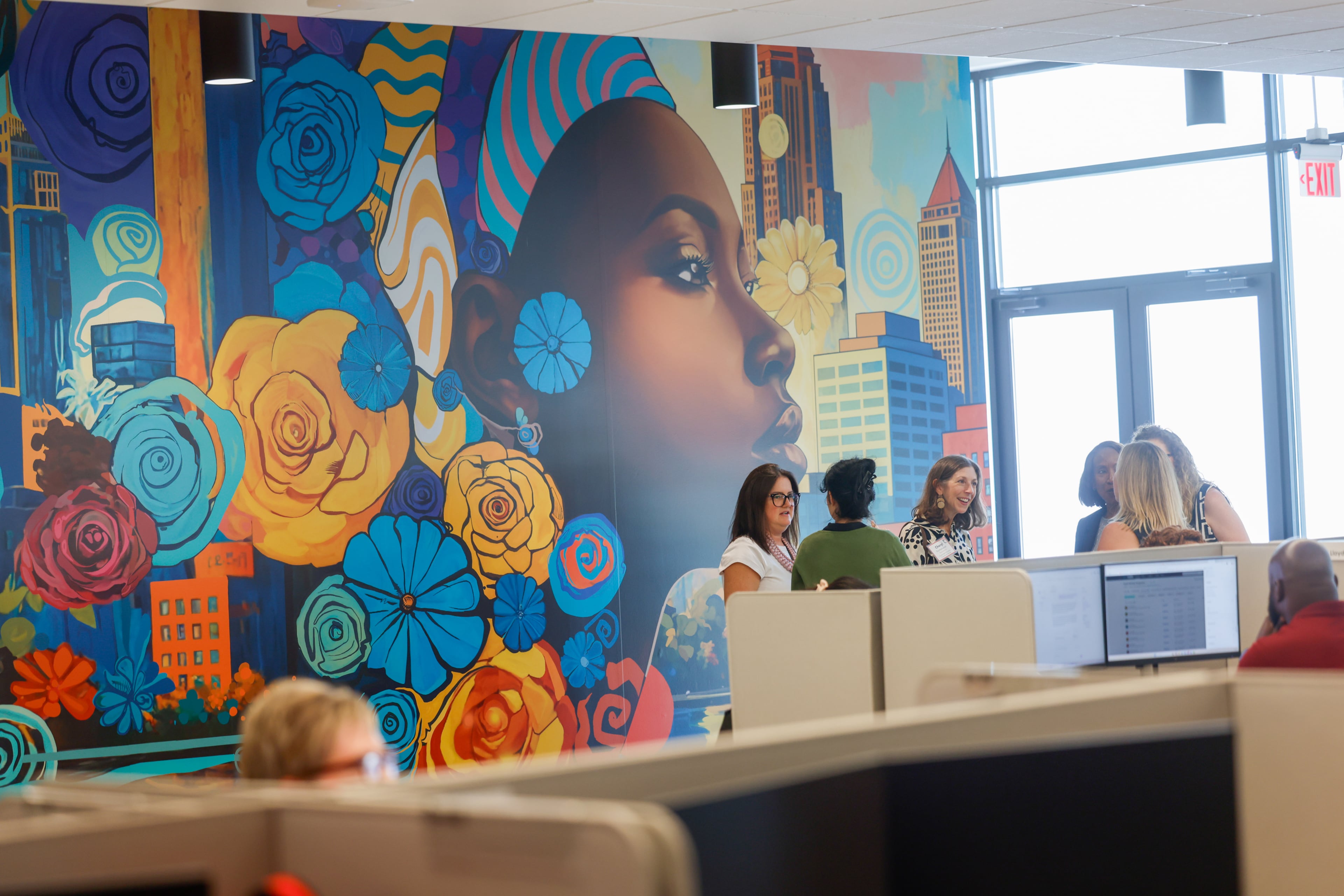 People tour the new TriNet office in Dunwoody on Aug. 18, 2026. It is one of the largest office announcements of the last few years and is an anchor for High Street. (Arvin Temkar/AJC)