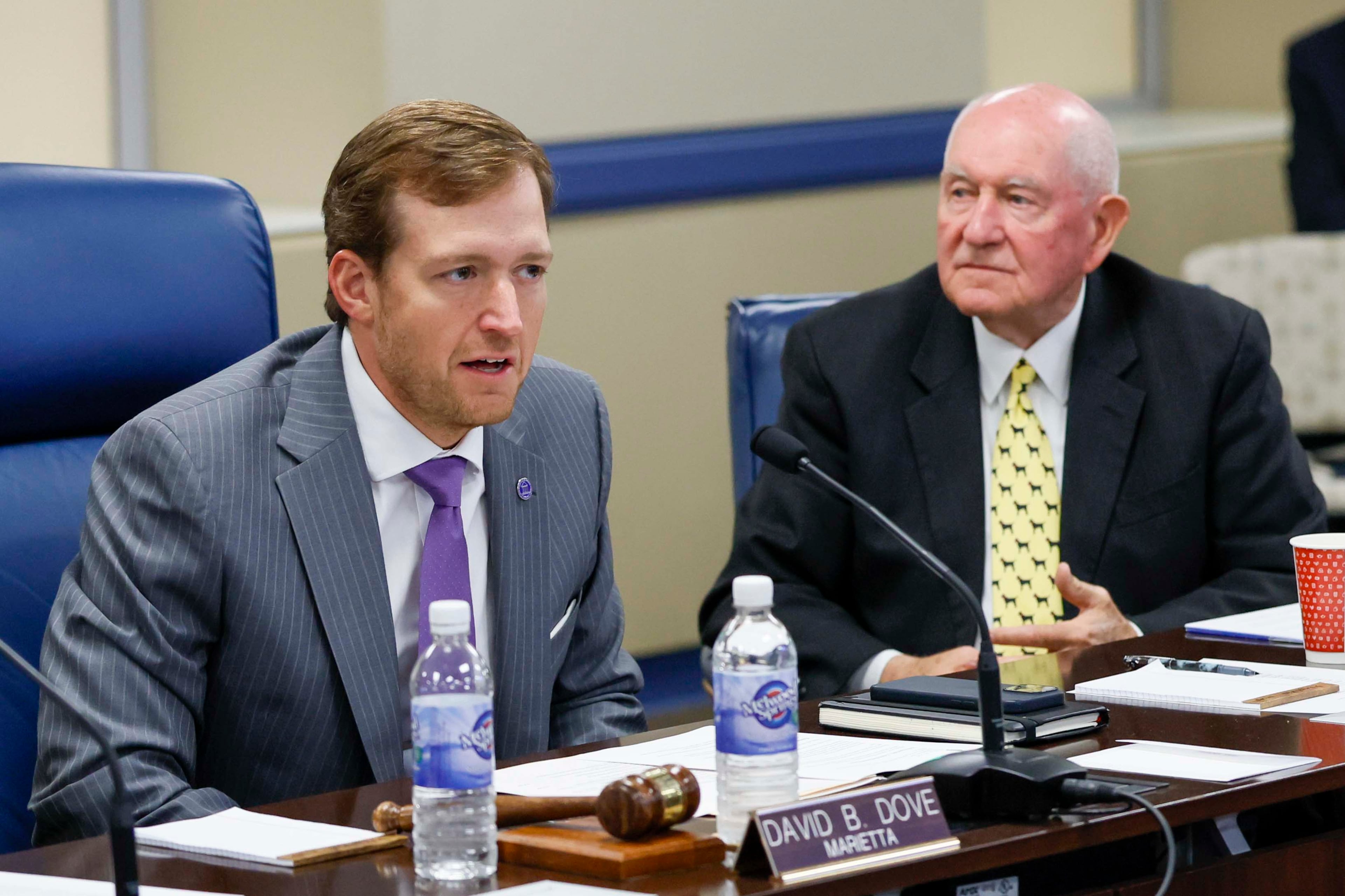 Chairman David B. Dove speaks as University System of Georgia Chancellor Sonny Perdue looks on during the Board of Regents meeting on Tuesday, May 12, 2026.
(Miguel Martinez/AJC)