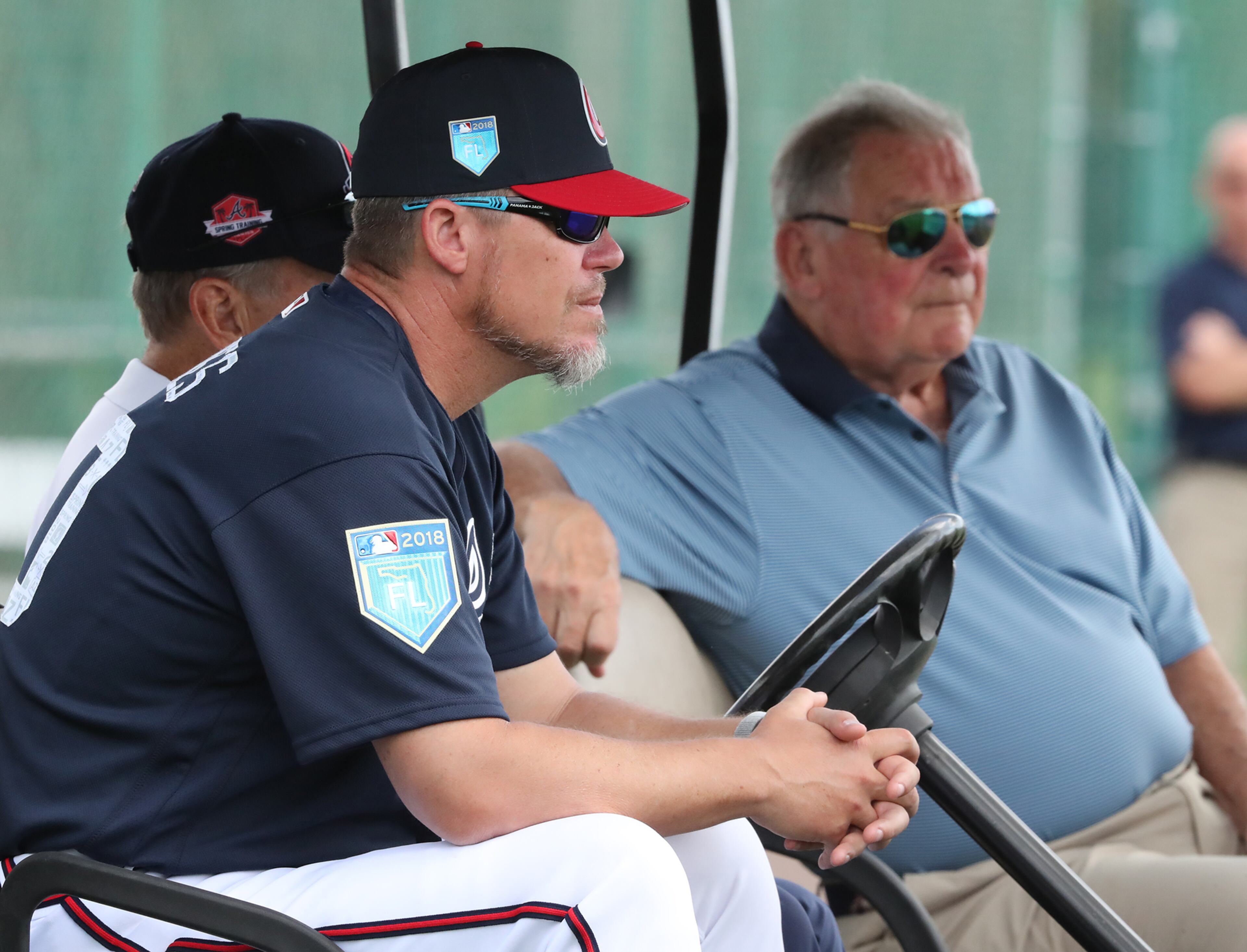 Bobby Cox and Chipper Jones watch batting practice Tuesday.