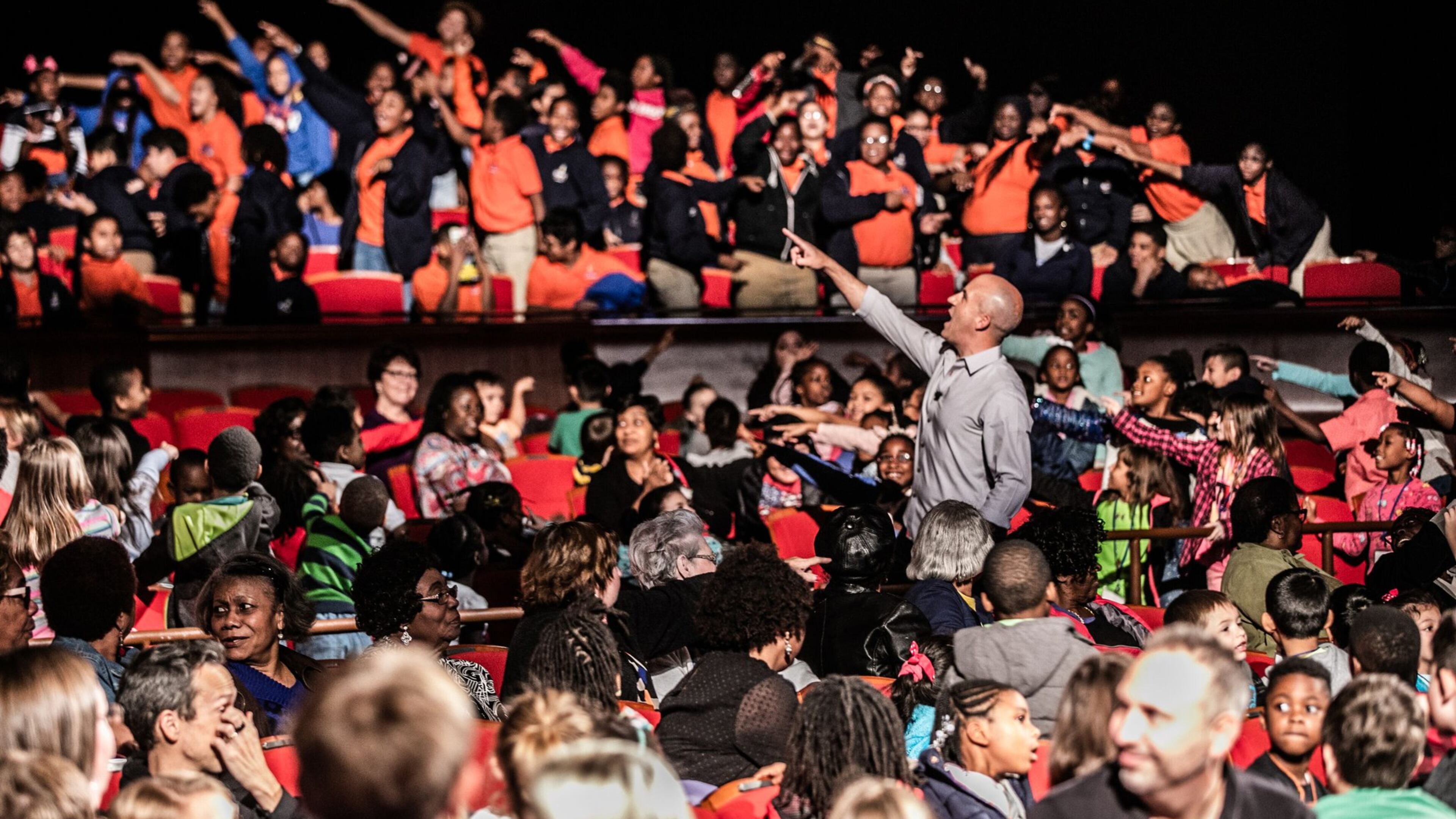 Magician Bill Blagg picks a member of the audience to help him to a magic trick during “The Science of Magic,” part ofthe ArtsBridge field trip season Wednesday, Oct. 23 at the Cobb Energy Performing Arts Centre. The nonprofit engages about 35,000 students every year with live theater performances that educate as well as entertain. COURTESY OF Chris Savas for ArtsBridge Foundation.