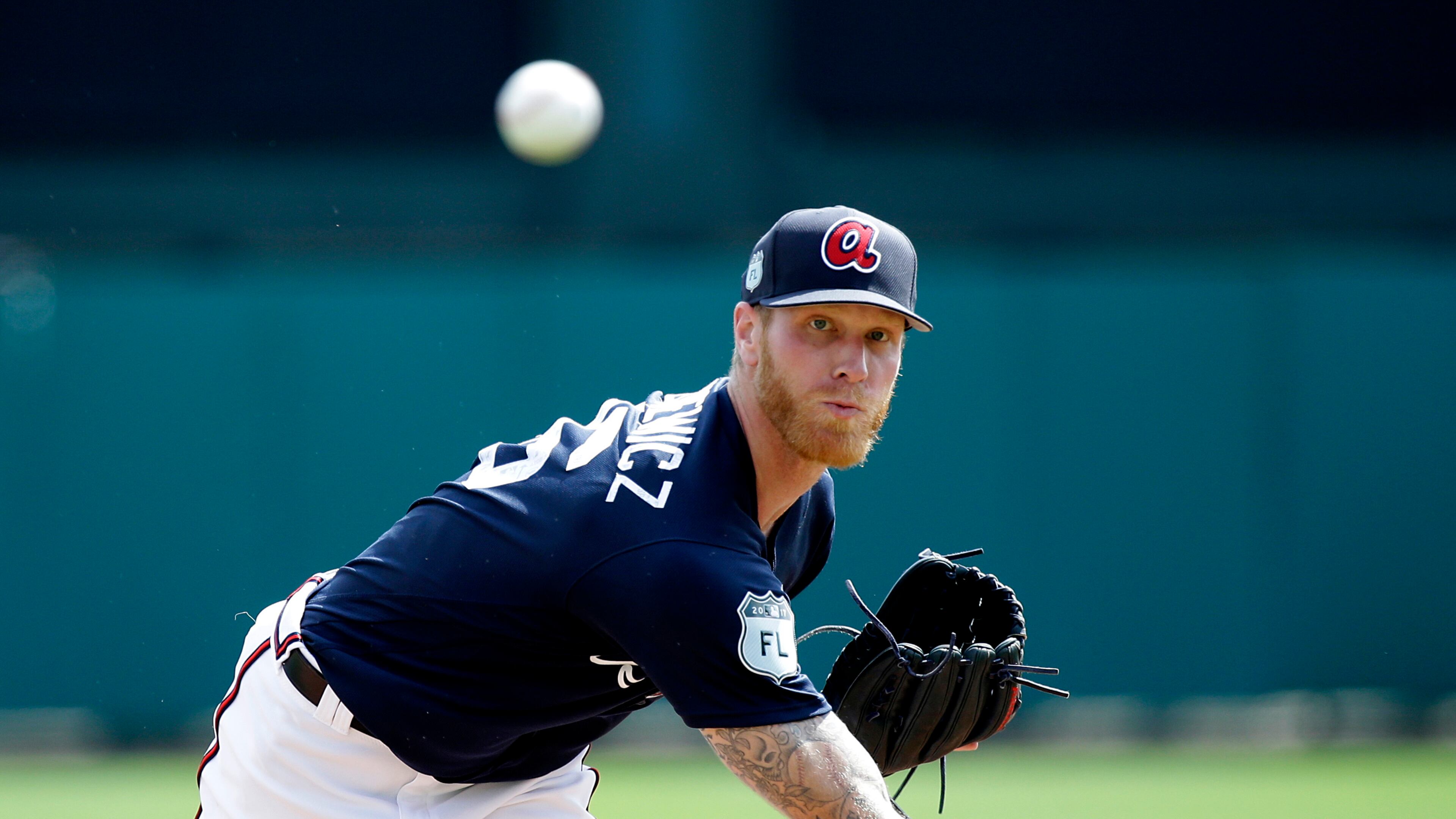Atlanta Braves starting pitcher Mike Foltynewicz (26) throws in the first inning against the St. Louis Cardinals in a spring training baseball game, Tuesday, Feb. 28, 2017, in Kissimmee, Fla. (AP Photo/John Raoux)