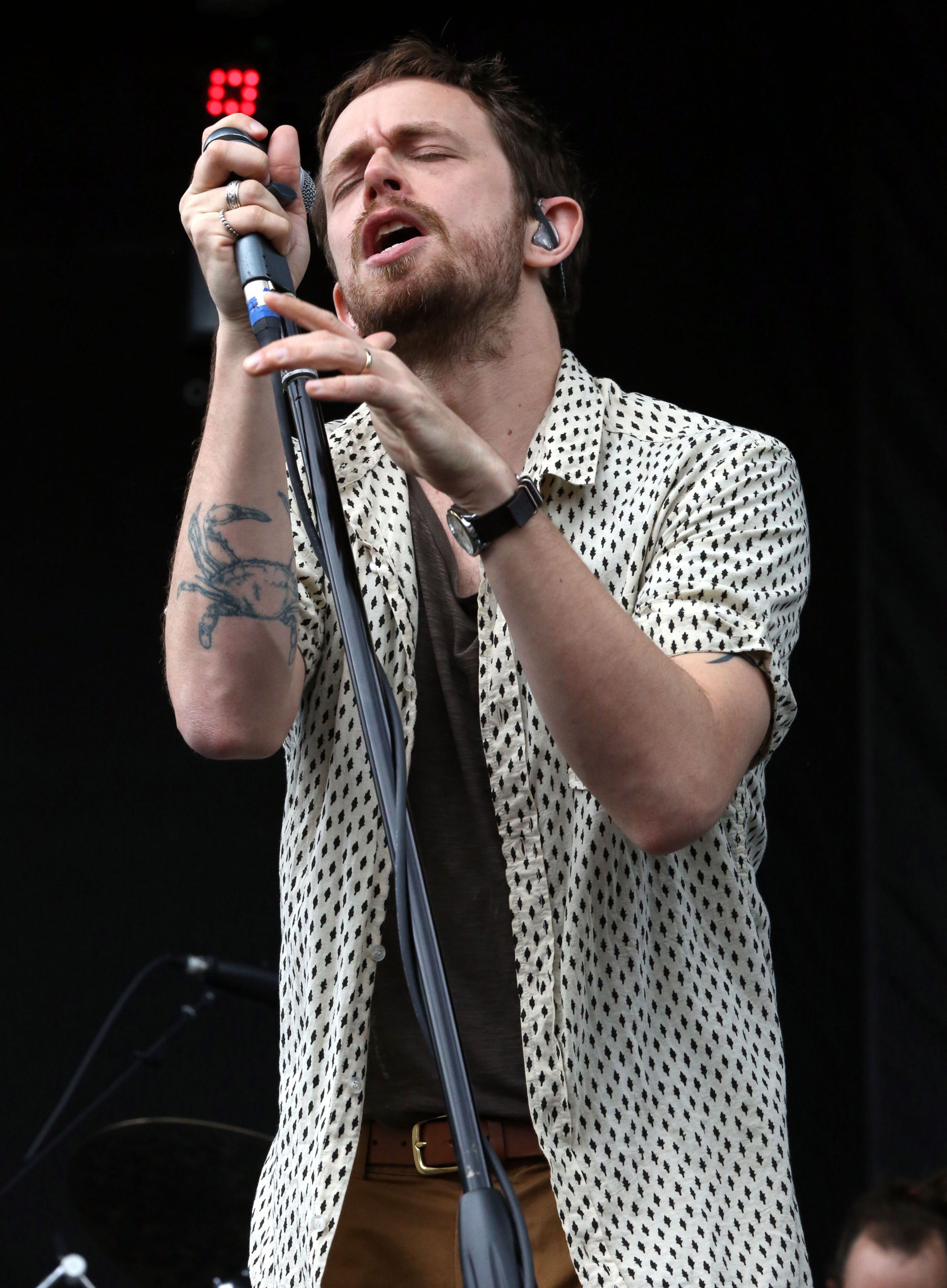 Chris Keating of Yeasayer performs.