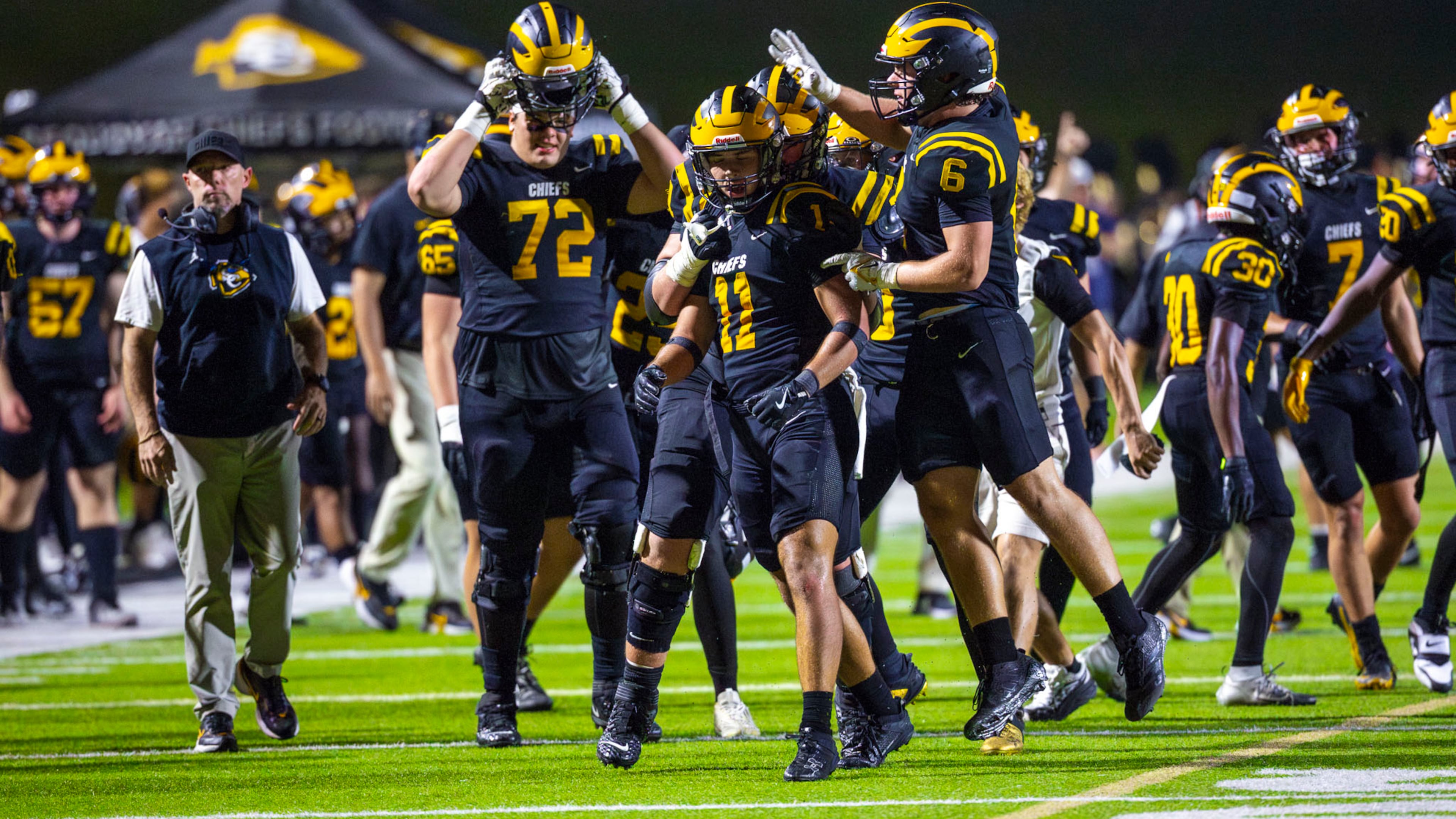 Sequoyah strong safety Asa Goings (11) celebrates with teammates after making an interception during the second half against Sprayberry at Skip Pope Stadium in Canton, on Friday, Sept. 12, 2025. (Oscar Guevara Saenz for the AJC)