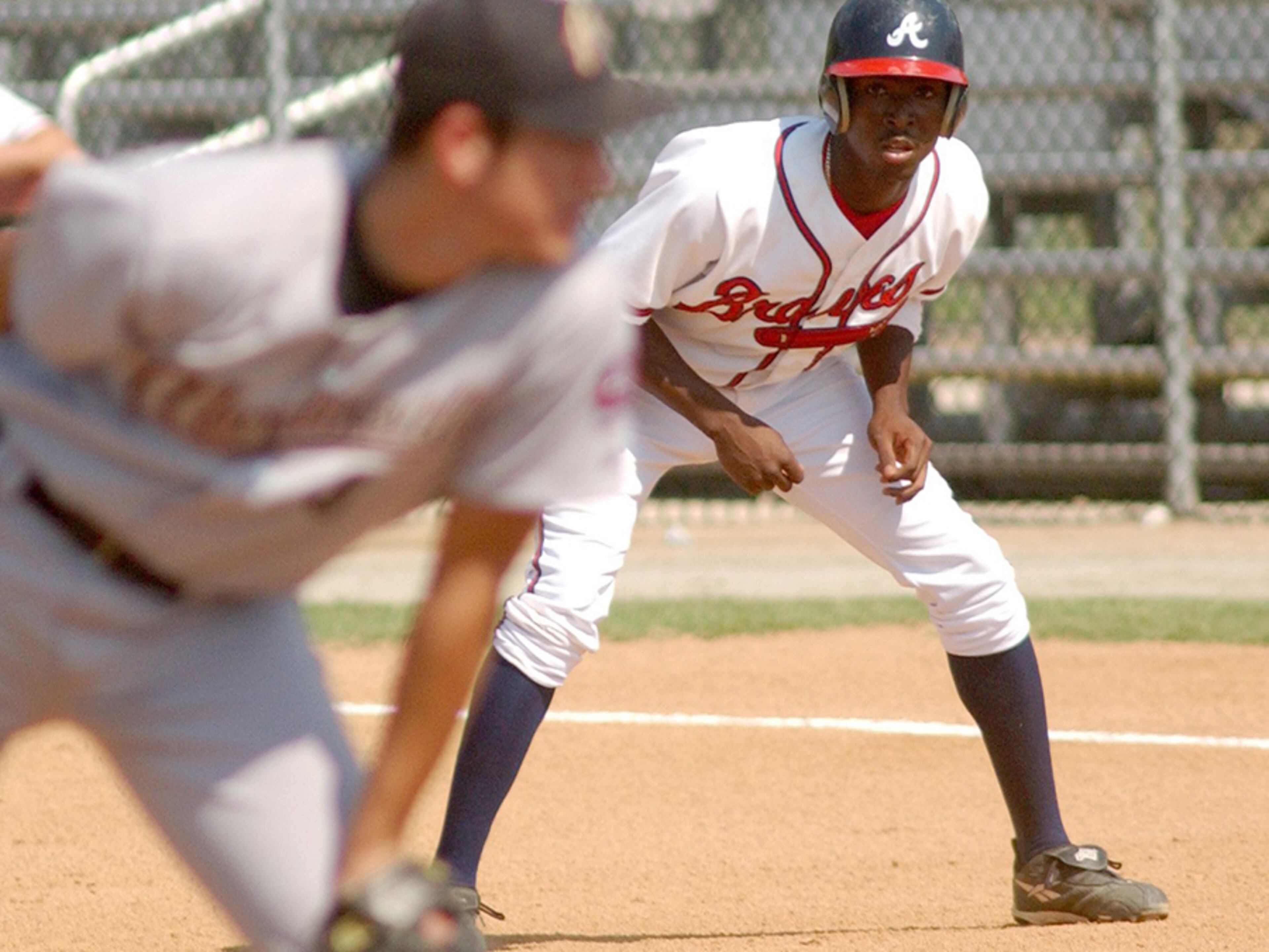 The Atlanta Braves' first-round pick (29th overall) in the 2001 draft was shortstop Josh Burrus. Burrus spent 6 seasons in the Braves' minor league system, playing shortstop, third base and all three outfield positions. His best year was in 2004 when he hit .272 with 123 stolen bases with Class A Rome. He was released by the Braves after the 2007 season. He had spent time as an assistant coach for his high school alma mater, the Wheeler (Marietta) Wildcats.
